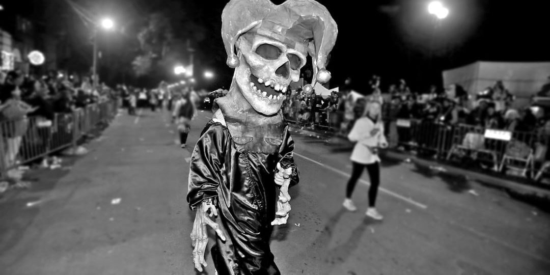 A skeleton parades during Mardi Gras in 2020. (Photo by Michael DeMocker)