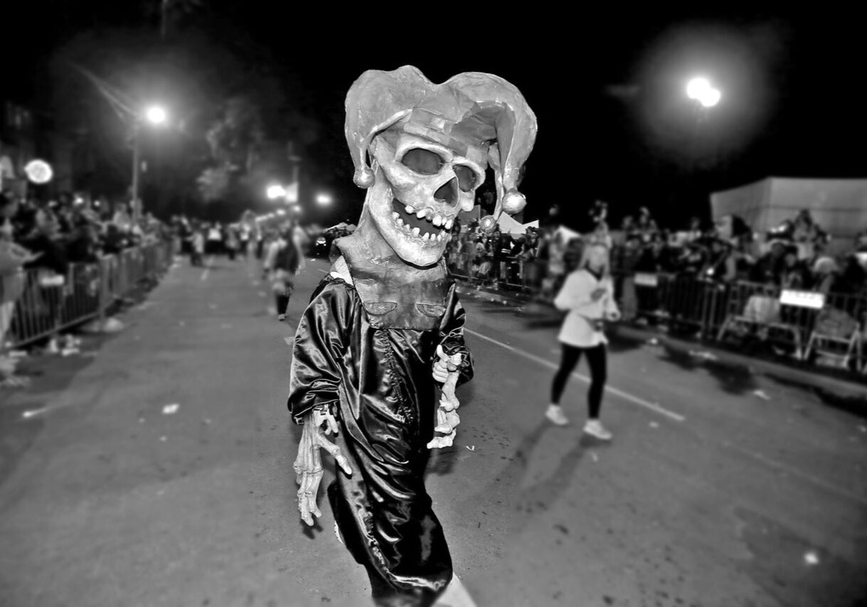 A skeleton parades during Mardi Gras in 2020. (Photo by Michael DeMocker)