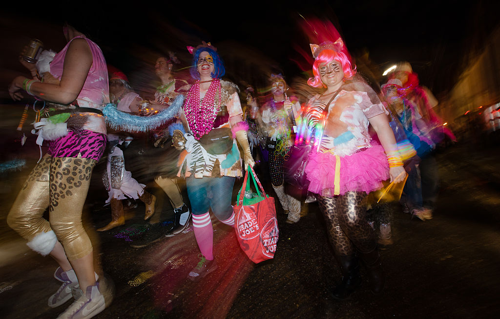 February 4, 2012, New Orleans, the Krewe du Vieux Mardi Gras parade's roles through the Marigny and then into the French Quarter. A group of people dressed as cats march in the parade. The theme for the Krewe du Vieux parade for 2012 was Crimes Against Nature. (Photo by Julie Dermansky/Corbis via Getty Images)