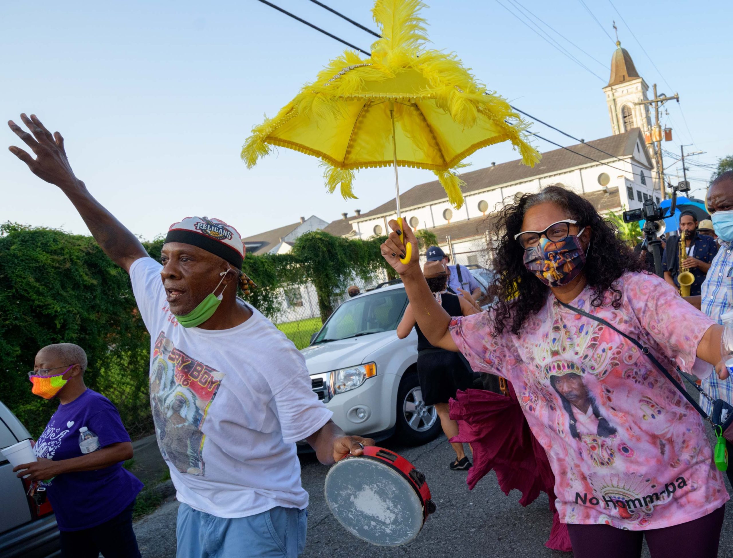 Spirit of FiYiYi spy boy Albert Polite, right, and baby doll Dianne Honore Destrehan, right, celebrate the life of Sylvester Hawk Francis at the Backstreet Cultural Museum next to the St Augustine Catholic Church in the Treme Neighborhood of New Orleans, Tuesday after Francis passed from a long illness.
Photo by Matthew Hinton