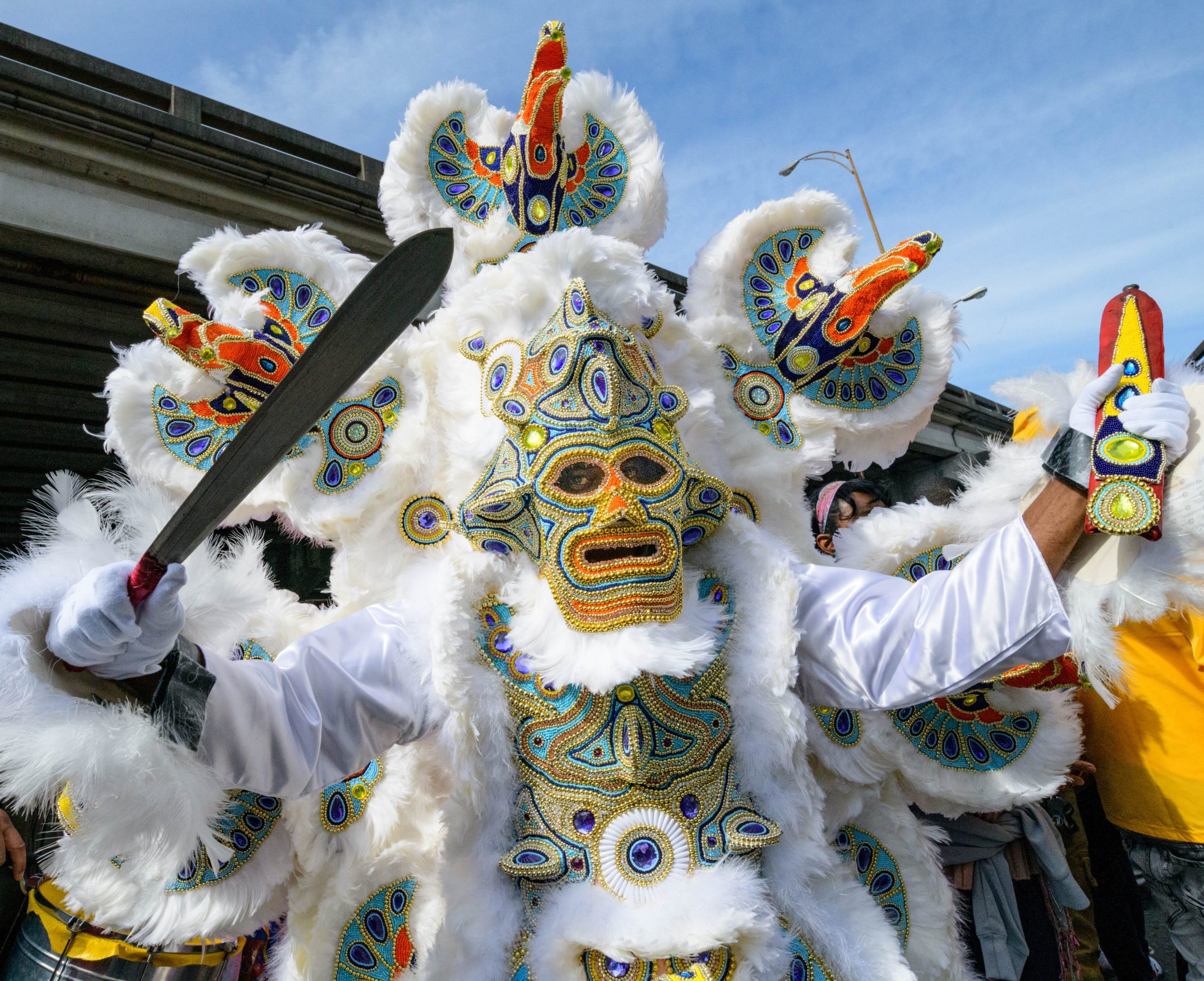 Mardi Gras Indians gather in the Treme neighborhood on Mardi Gras in New Orleans, La., March 5, 2019.  The Mardi Gras Indian tradition has African, Creole, and Caribbean roots. Some of the early gang members were descendants of slaves and Native Americans. Photo by Matthew Hinton