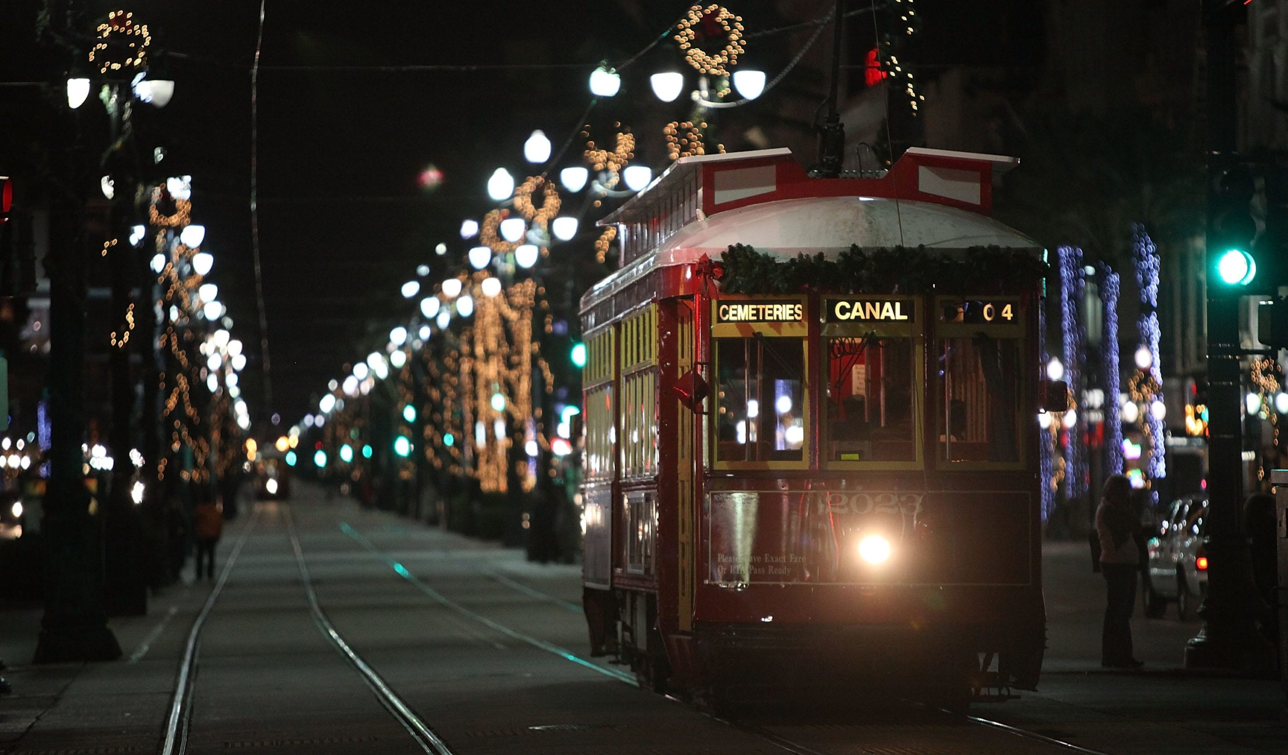 NEW ORLEANS - DECEMBER 02: A streetcar passes along Canal Street decorated with Christmas lights December 2, 2009 in New Orleans, Louisiana. People across the country are getting into the holiday spirit as Christmas approaches. (Photo by Mario Tama/Getty Images)