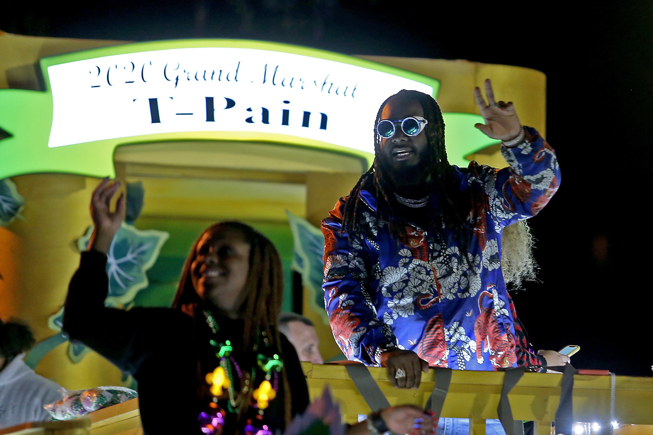 Grand Marshal T-Pain waves to the crowd as the 550 members of Pygmalion roll down the Uptown parade route with an Italy-themed 25-float parade entitled “Viaggia in Italia”. Cary Oswald reigned as King Pygmalion and Kalli Mercer was Queen Pygmalion as the krewe presented their 21st annual parade on Saturday, February 15, 2020. (Photo by Michael DeMocker)