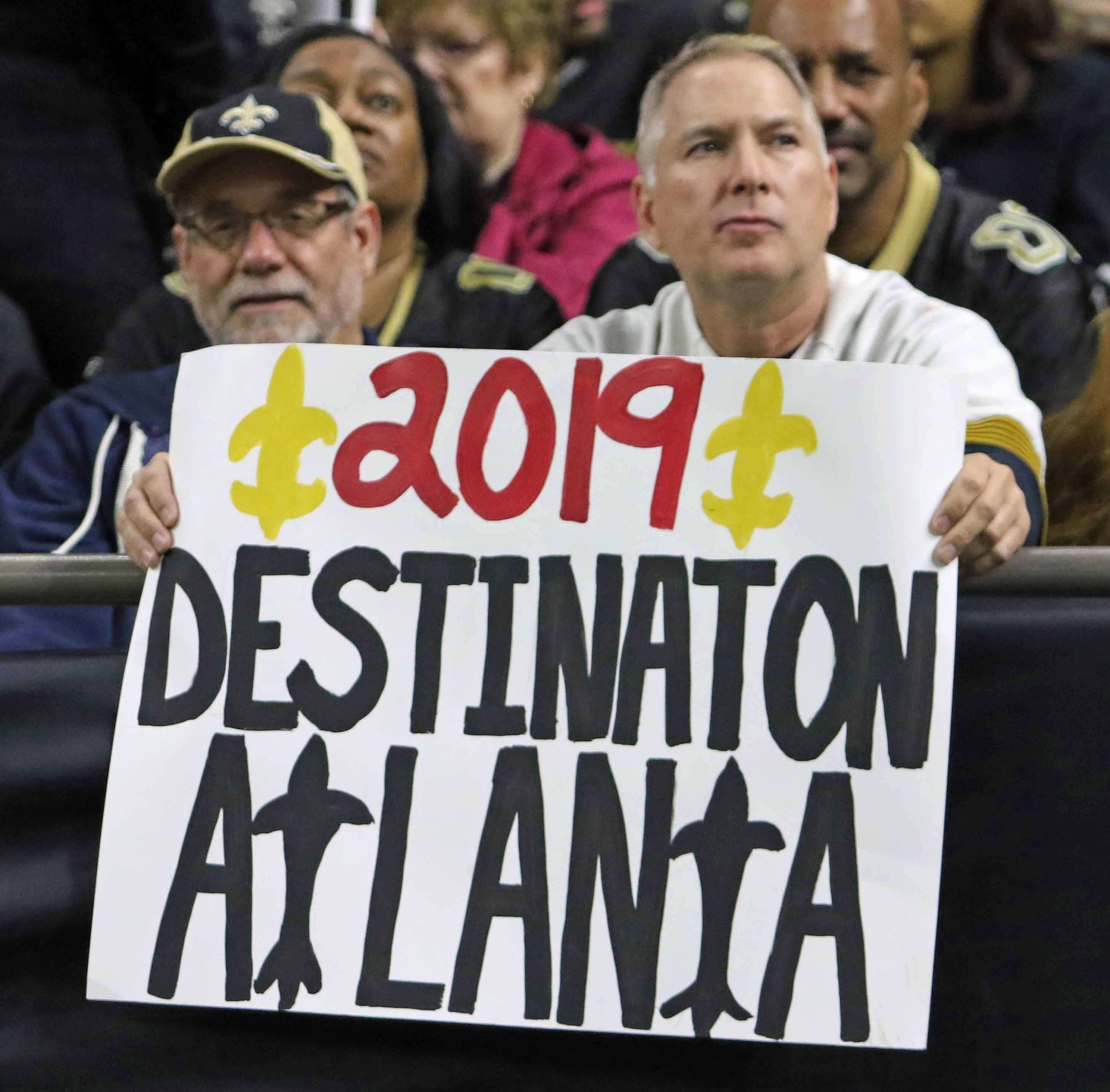 New Orleans Saints superfan Larry Rolling holds up a 2019 Destination - Atlanta sign during the New Orleans Saints vs. Carolina Panthers game at the Mercedes-Benz Superdome in New Orleans on Sunday, December 30, 2018.  (Photo by Peter G. Forest)