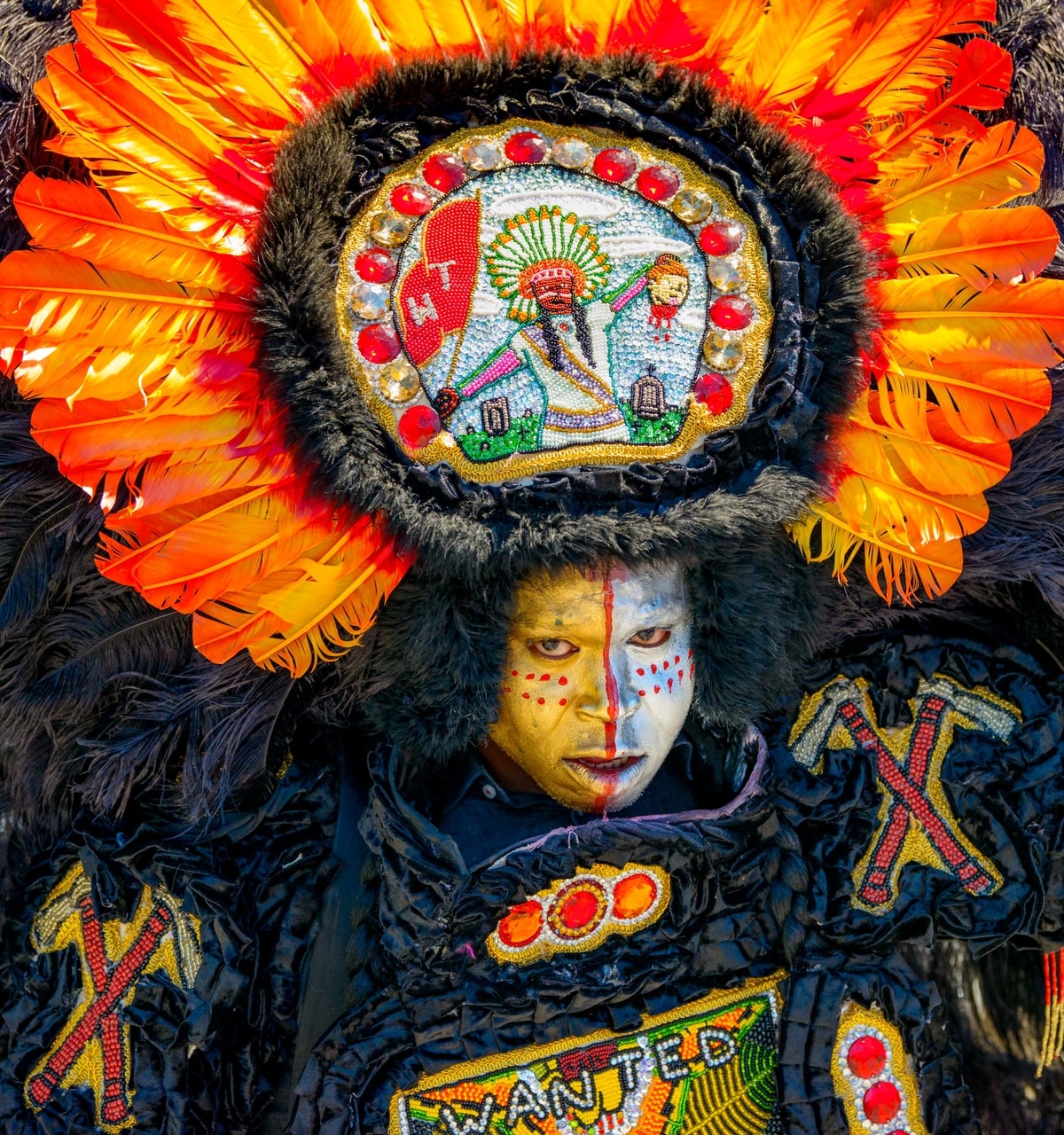 Mardi Gras Indians including Flag Boy Giz Hartley Aguillard of the Wild Tchoupitoulas take part in the West Bank Super Sunday in the Algiers neighborhood in New Orleans, La. Sunday, April 14, 2019.