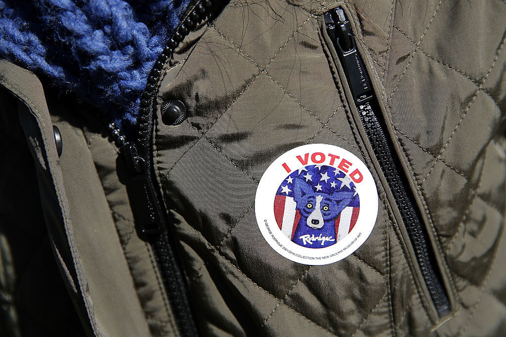 NEW ORLEANS, LA - DECEMBER 10:  An "I Voted" sticker featuring local Louisiana artist George Rodrigue's Blue Dog is worn by a voter on December 10, 2016 in New Orleans, Louisiana. Louisiana residents head to the polls on Saturday to select a U.S. Senator in a runoff election between Democratic candidate Foster Campbell and Republican candidate John Kennedy. (Photo by Jonathan Bachman/Getty Images)