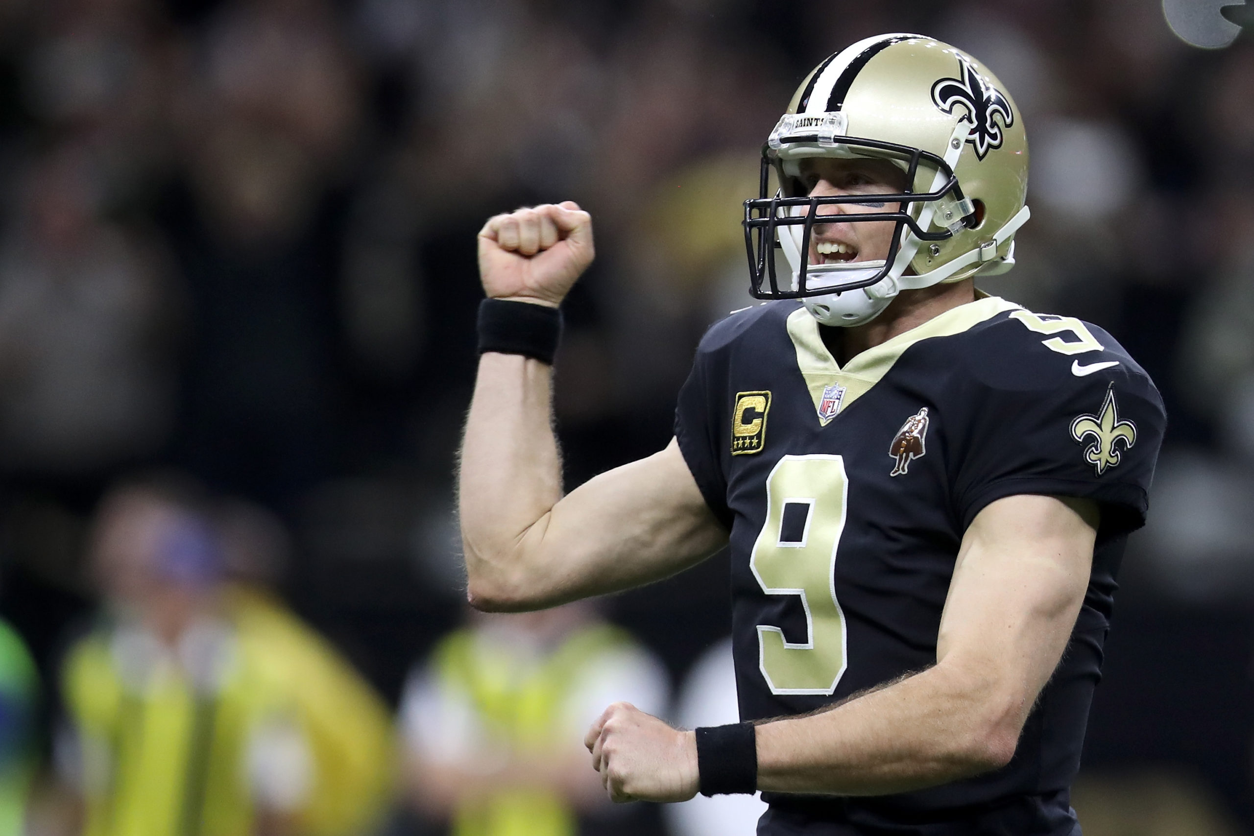NEW ORLEANS, LA - JANUARY 07:  Drew Brees #9 of the New Orleans Saints reacts after throwing a touchdown pass against the Carolina Panthers at the Mercedes-Benz Superdome on January 7, 2018 in New Orleans, Louisiana.  (Photo by Chris Graythen/Getty Images)