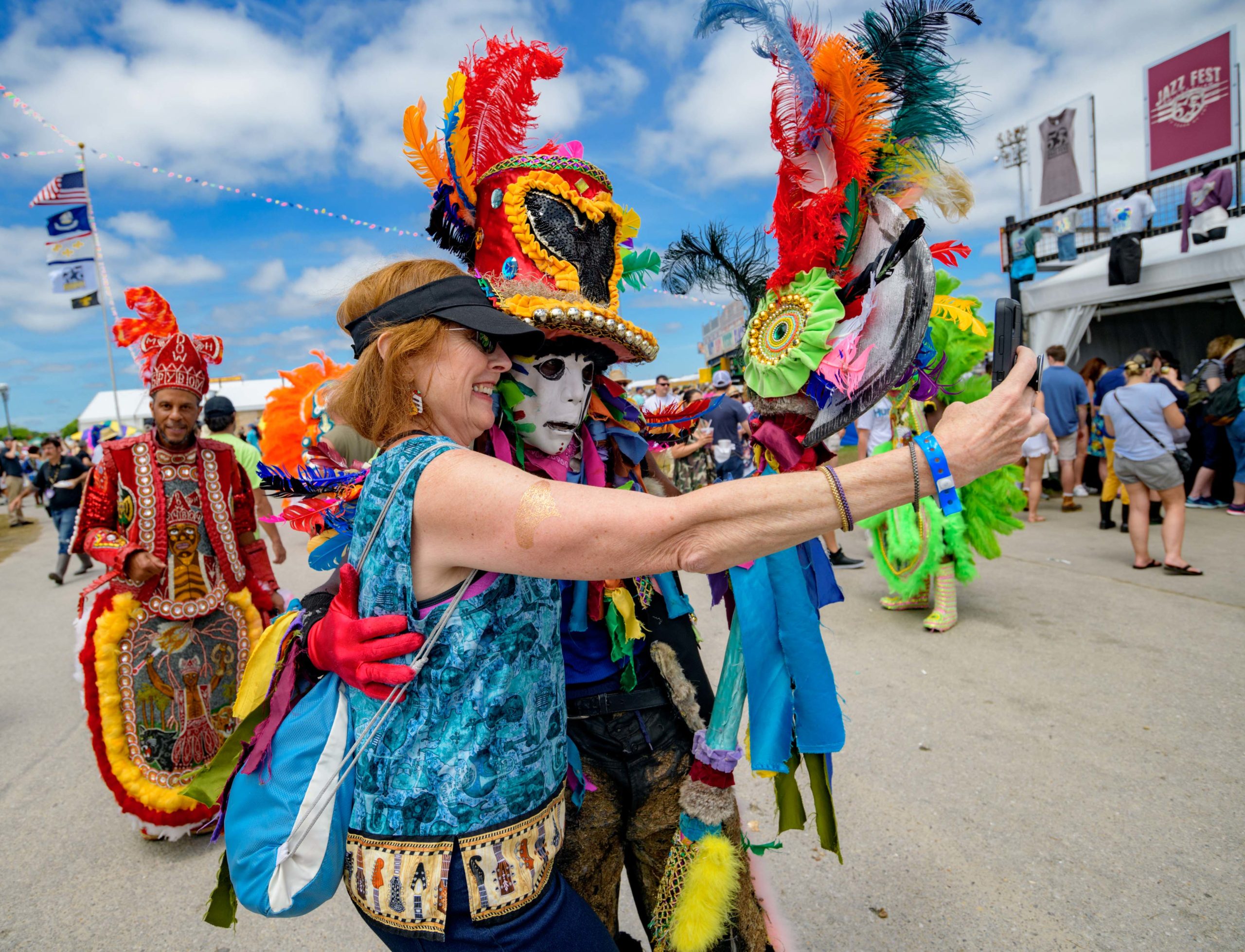 Moss Man Tyrone Casby, Jr. of the Mohawk Hunters Mardi Gras Indians parades at the Fair Grounds during the New Orleans Jazz and Heritage Festival or Jazz Fest in New Orleans, La. Sunday, May 5, 2019. Photo by Matthew Hinton