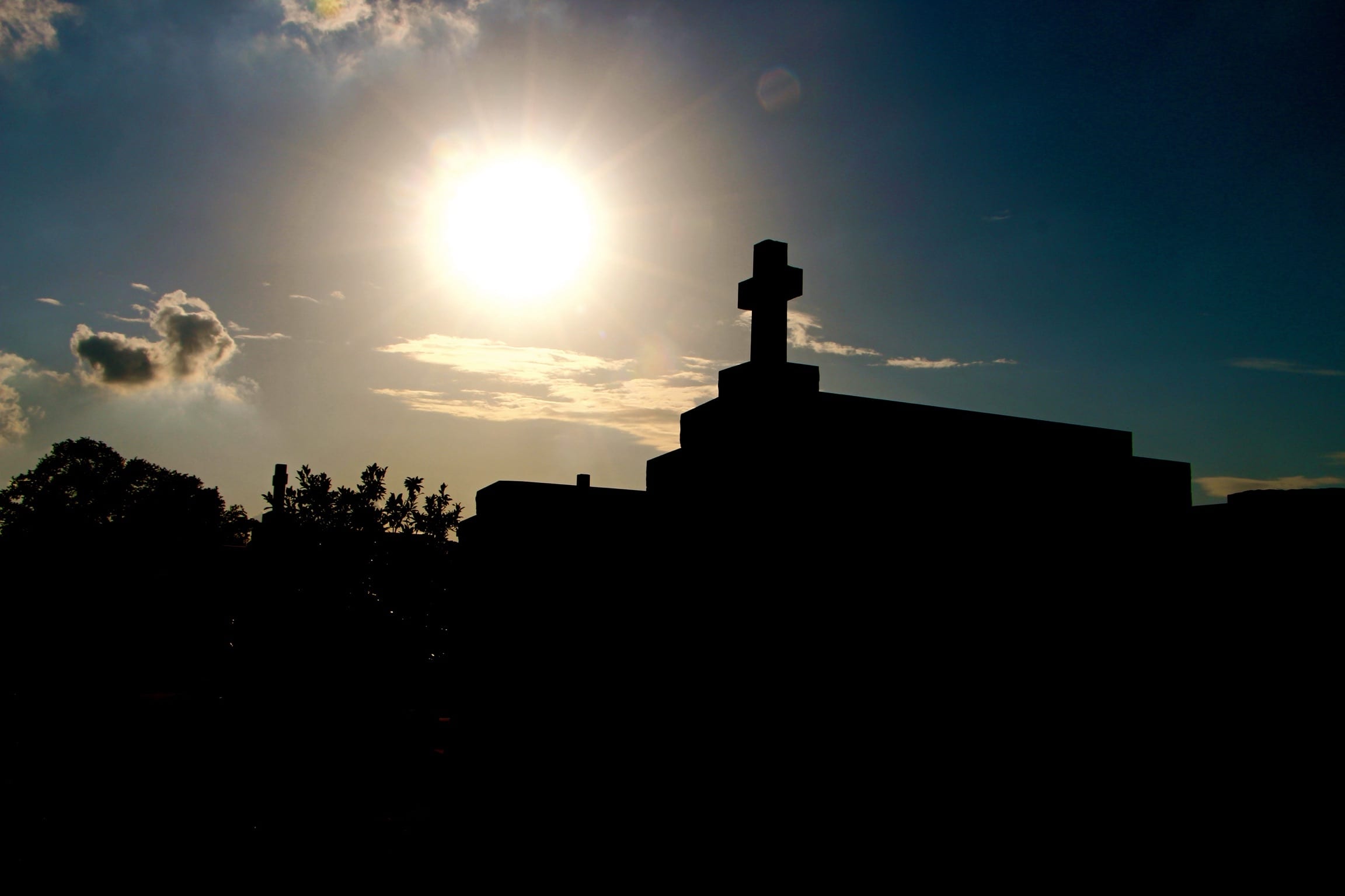 Low Angle View Of Silhouette Church Against Sky On Sunny Day