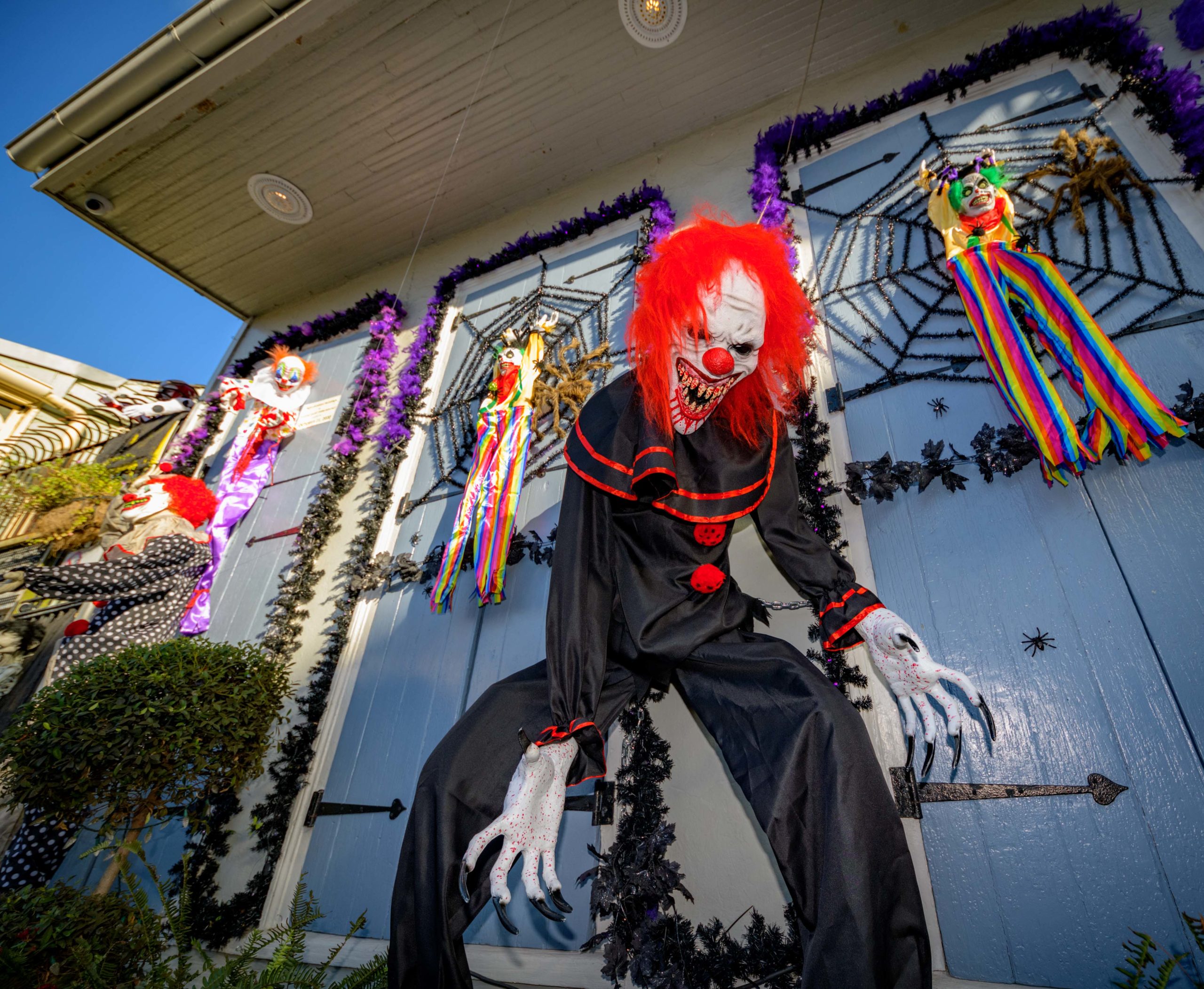 Clowns are even scary in the daylight in front of this French Quarter home. Photo by Matthew Hinton