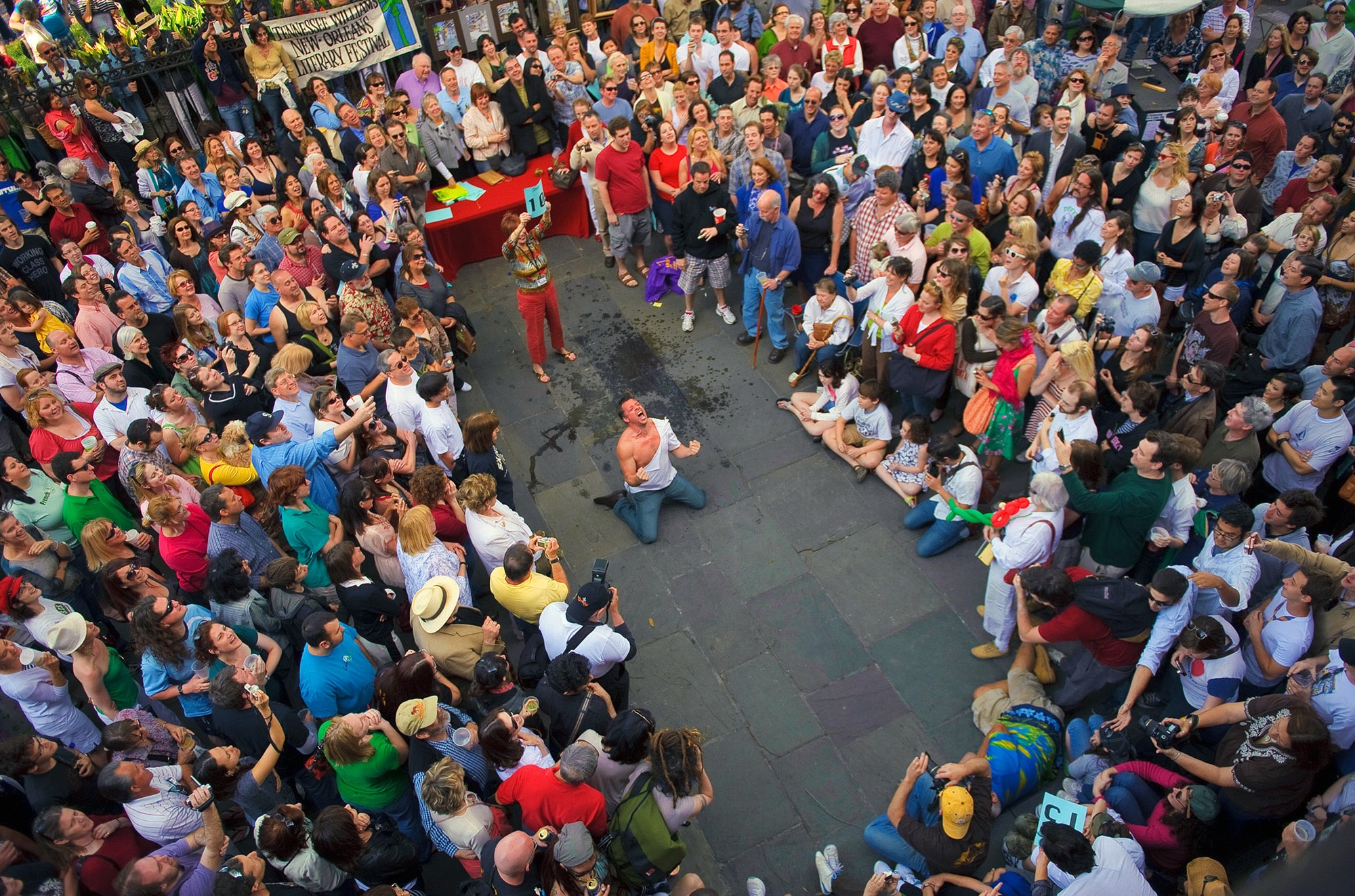 Jeremy Johnson of New Orleans gets on his knees to shout for "STELLAAAAA!!!" in the unforgettable scene from A Streetcar Named Desire during the Stella yelling contest in Jackson Square that was part of a pre-pandemic Tennessee Williams and New Orleans Literary Festival. Contestants from New York to New Orleans competed in the annual Stella and Stanley yelling contest that brings a dramatic end to the Tennessee Williams Festival each year in New Orleans.