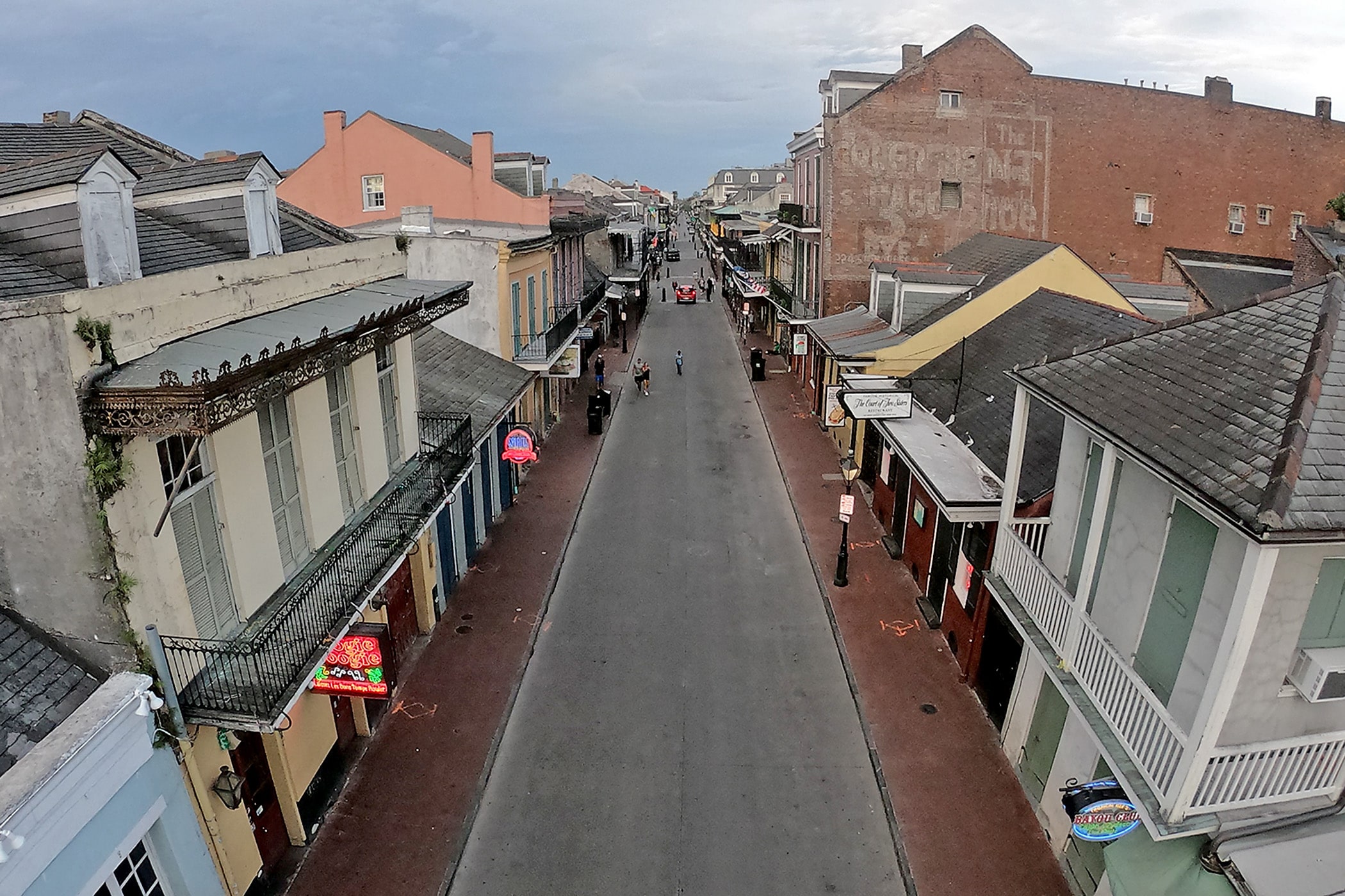 Instead of the usual St. Patrick’s Day crowds, Bourbon Street is empty Tuesday evening, the day after the state shut down bars and curtailed restaurant operations in response to the Covid-19 pandemic. Photographed on Tuesday, March 17, 2020.