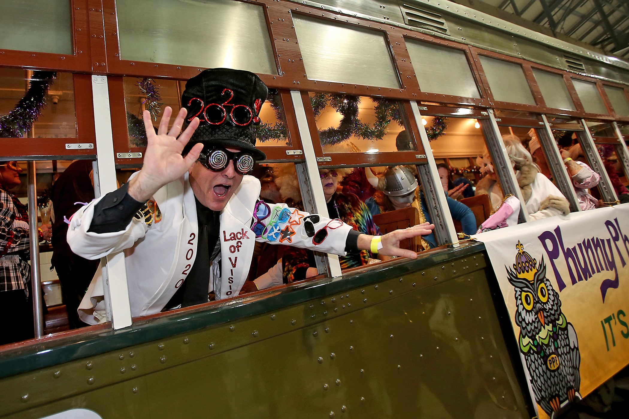 The men and women of the Phunny Phorty Phellows embark on their traditional Twelfth Night streetcar ride, leaving from the Willow Street car barn and riding the tracks through New Orleans to herald the start of Carnival season on Monday, January 6, 2020.