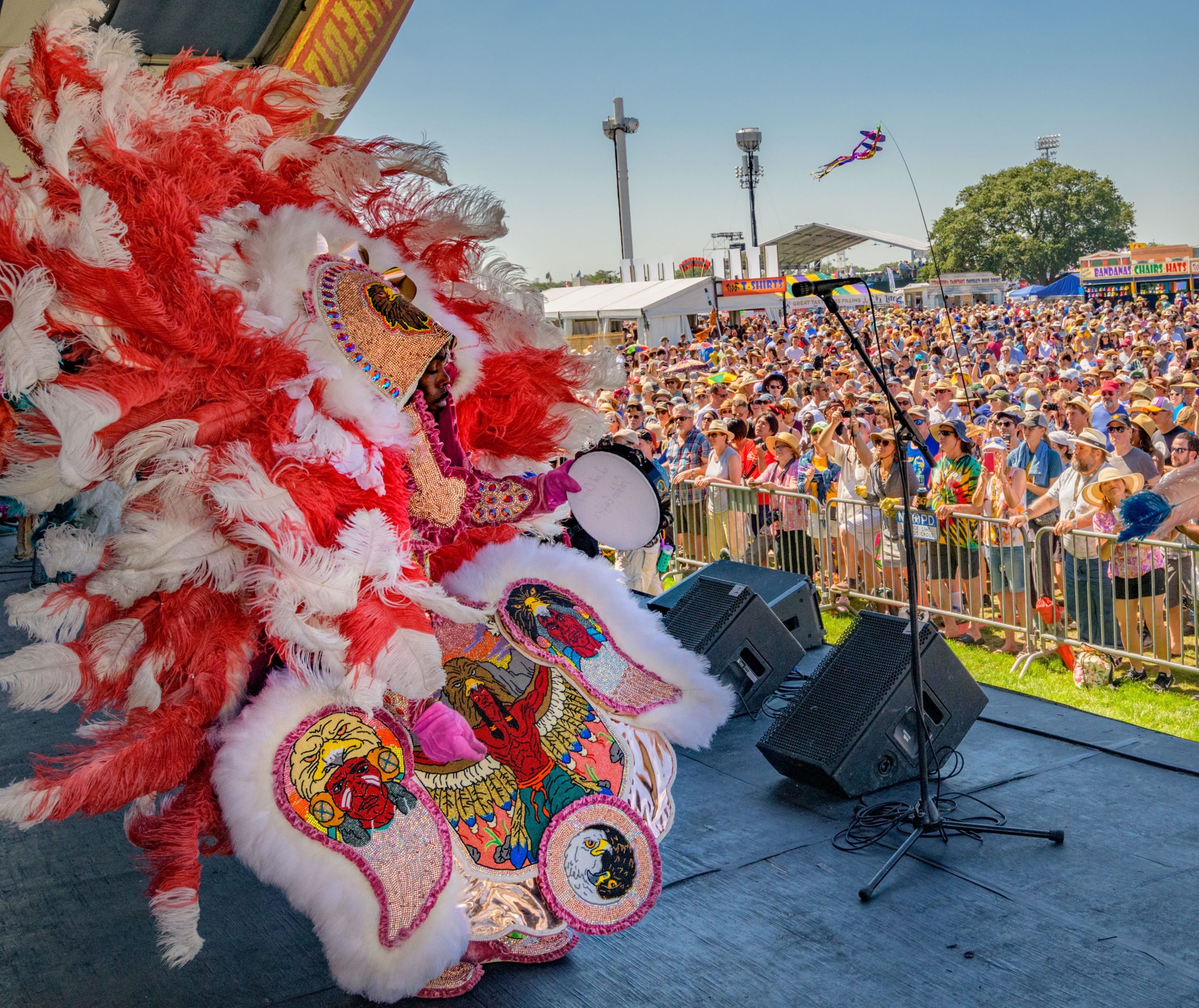 Big Chief Monk Boudreaux and the Golden Eagles Mardi Gras Indians including Second Chief Joseph Boudreaux, Jr., perform during the 50th New Orleans Jazz and Heritage Festival at the Fair Grounds in New Orleans, La. Sunday, April 28, 2019. Boudreaux performed during the first Jazz and Heritage Festival in 1970. Photo by Matthew Hinton