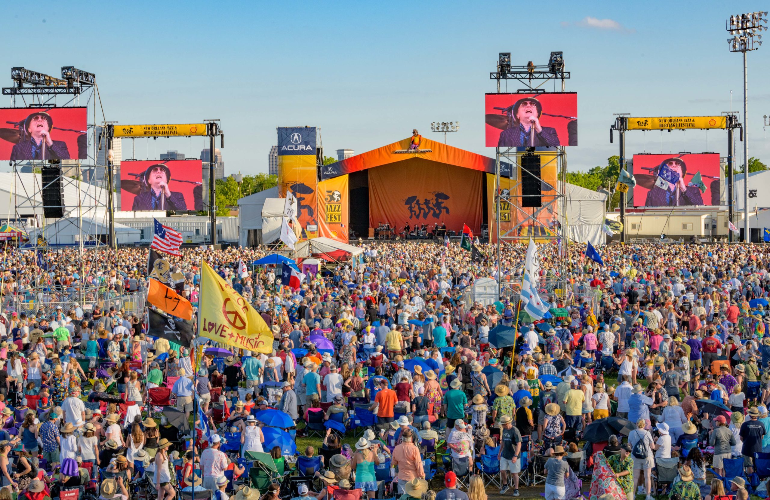 A crowd watches Van Morrison on the Acura Stage during the 50th New Orleans Jazz and Heritage Festival at the Fair Grounds in New Orleans, La. Sunday, April 28, 2019. Photo by Matthew Hinton