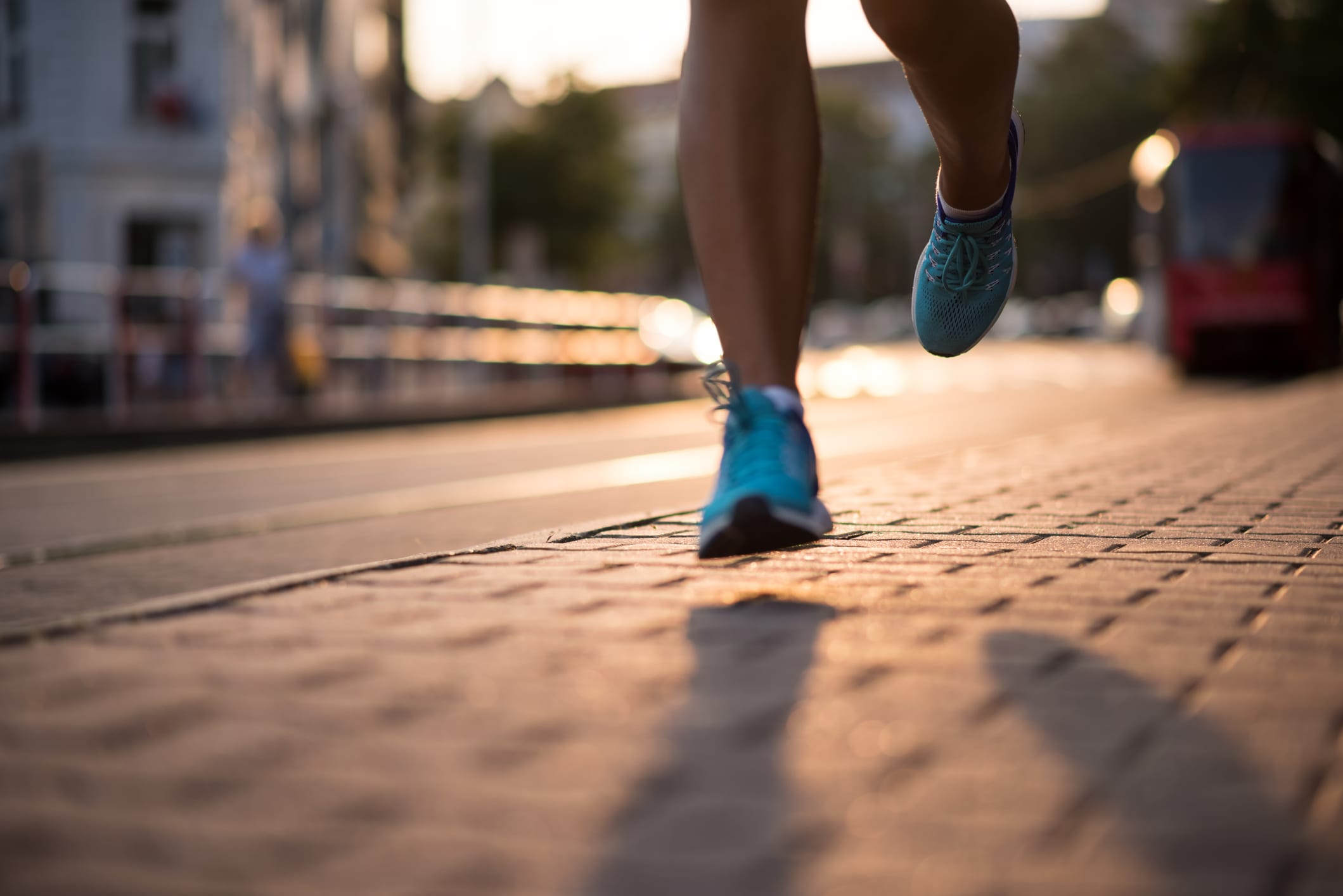 Fitness woman jogging and workout, legs closeup.