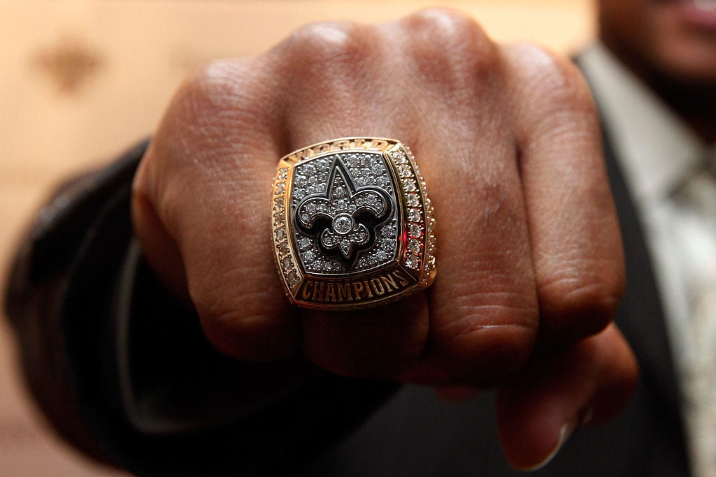 NEW ORLEANS - JUNE 16:  A member of the New Orleans Saints shows off his ring from Super Bowl XLIV on June 16, 2010 in New Orleans, Louisiana.  (Photo by Chris Graythen/Getty Images)