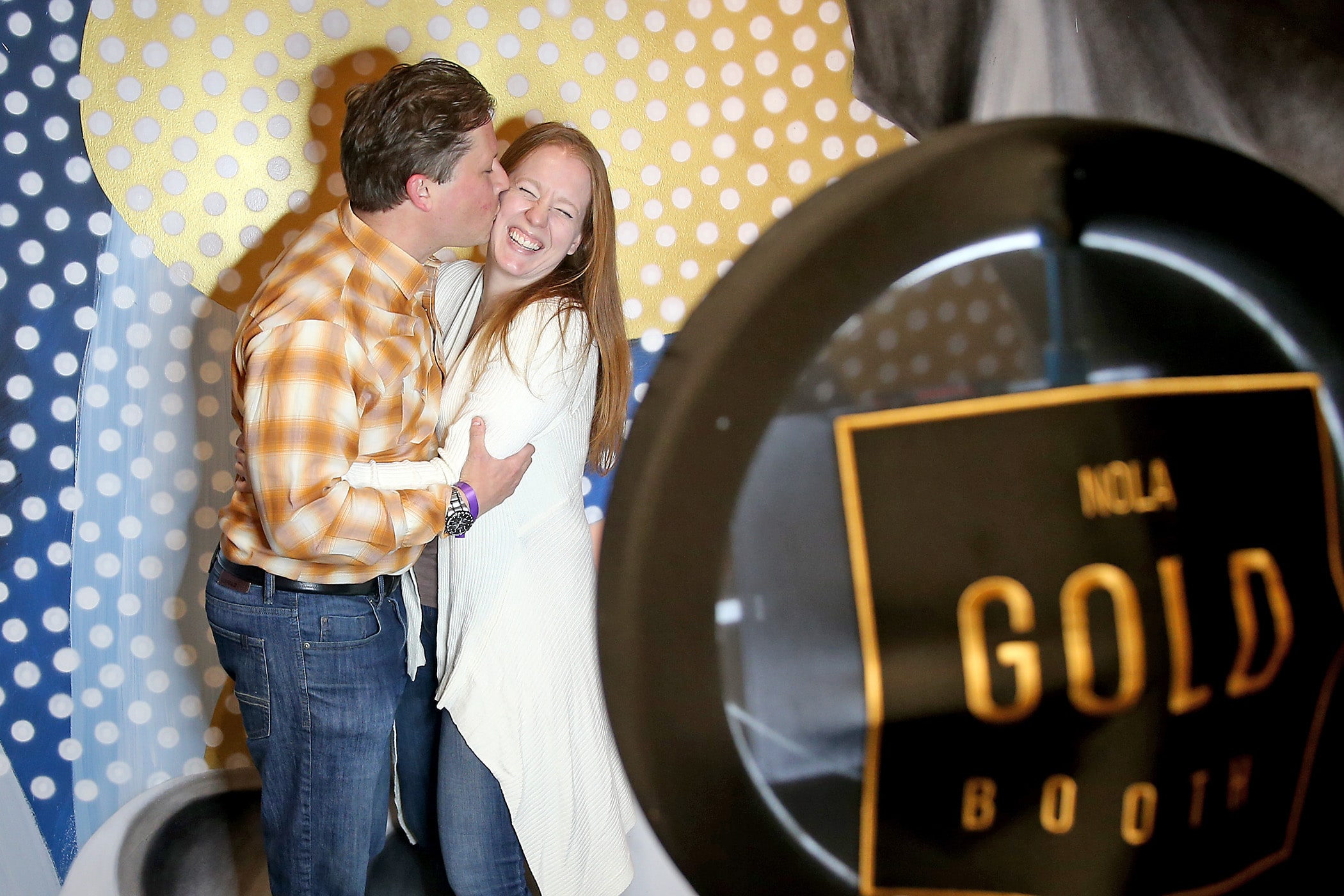 Loren Gragert (L) and Amanda Heitz have fun in the photo booth during the Friendsgiving with Very Local New Orleans at the Shops at the CAC on Saturday, November 16, 2019. (Photo by Michael DeMocker)