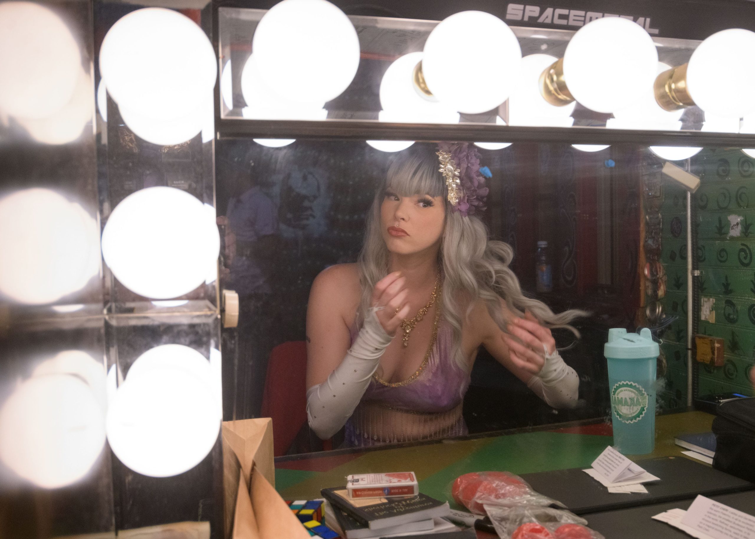 New Orleans resident and burlesque dancer Harper Hexx, which is her stage name, performs in the 2019 Queen of Burlesque competition during the 11th annual New Orleans Burlesque Festival at the House of Blues Saturday, September 14, 2019. The festival last three days with burlesque and other performers including escape artists, tap dancers, comedians and magicians. The main event invites burlesque dancers from around the world to perform to the music of a live jazz band and the chance to be crowned Queen at the end of the night. Hexx finished as the second runner-up to Albadoro Gala, a burlesque dancer from Italy. Hexx began as an exotic dancer on Bourbon Street at age 19 and said the first time she took her top off on stage she got a feeling of pure adrenaline. She has had her ups and downs since then dancing in the French Quarter. She is a recovering alcoholic and says one of her low points was falling down drunk. Now she uses mediation and yoga to help keep her mind clear. She recently joined Bustout Burlesque created by Rick Delaup, who also runs the festival, and has rededicated herself to learn more about the art and history of burlesque dancing including meeting Kitty West, also known as Evangeline the Oyster Girl, before she passed this year. Harper Hexx performs as least once a week and feels that dancing, like her mediations, keeps her centered. Other performers in the competition include dancers Queen Etouffante, Petit Cheire, Demi Dior, Sheila Shortcake, Lil Steph, and singer Naydja CoJoe. Photo by Matthew Hinton