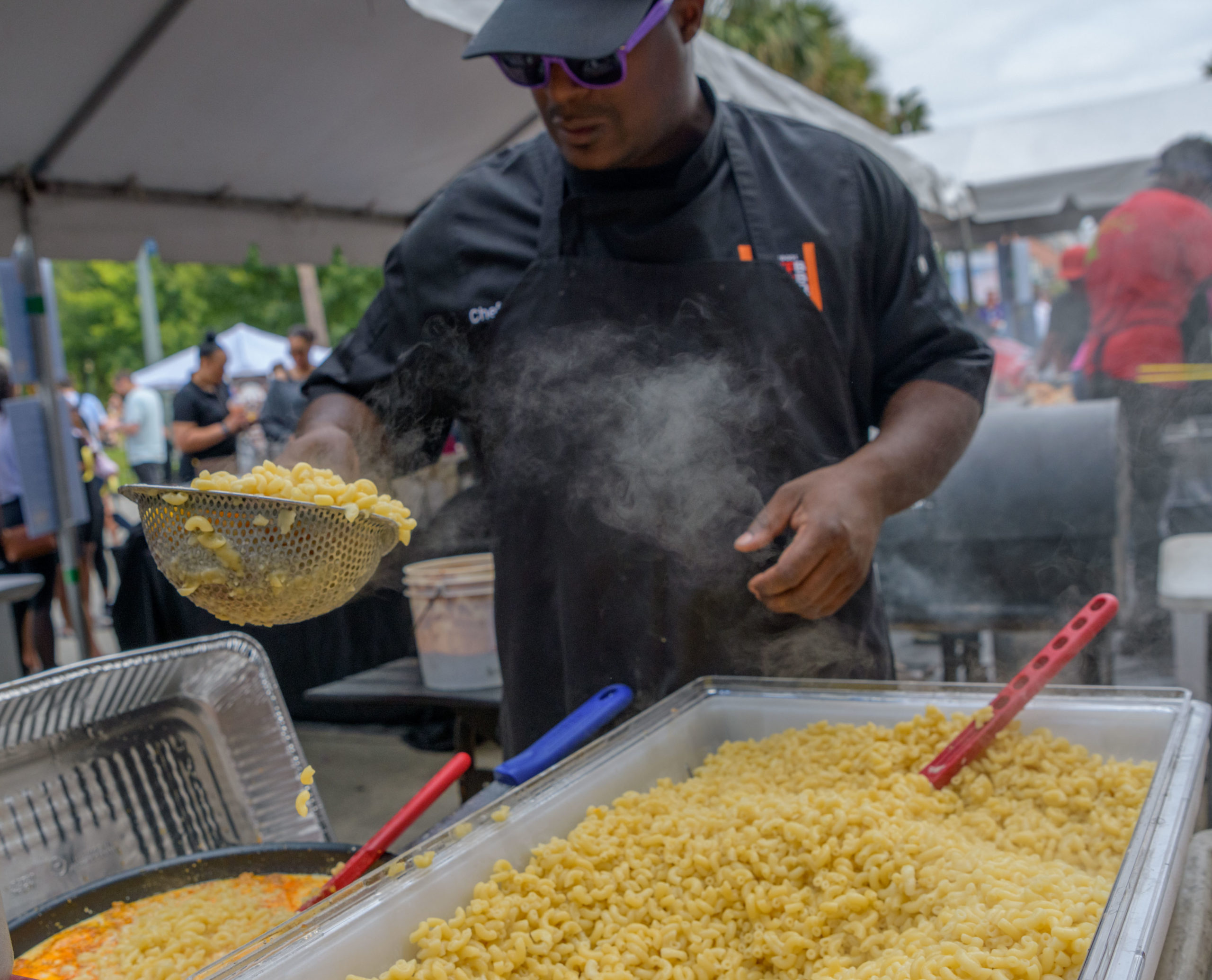 Chef Scotts Creole BBQ cooks up some hot sausage mac and cheese at the NOLA Mac N Cheese Fest in Louis Armstrong Park Saturday, October 12, 2019 in New Orleans. The 3rd annual festival presented by Waitr featured local restaurants and include performances by the Red Hot Gentilly Peppers, DJ Doug Funnie, Big Chief Juan Pardo,
J &amp; The Causeways, and Robin Barnes. A portion of  proceeds from the event will benefits Special Olympics Louisiana. Photo by Matthew Hinton