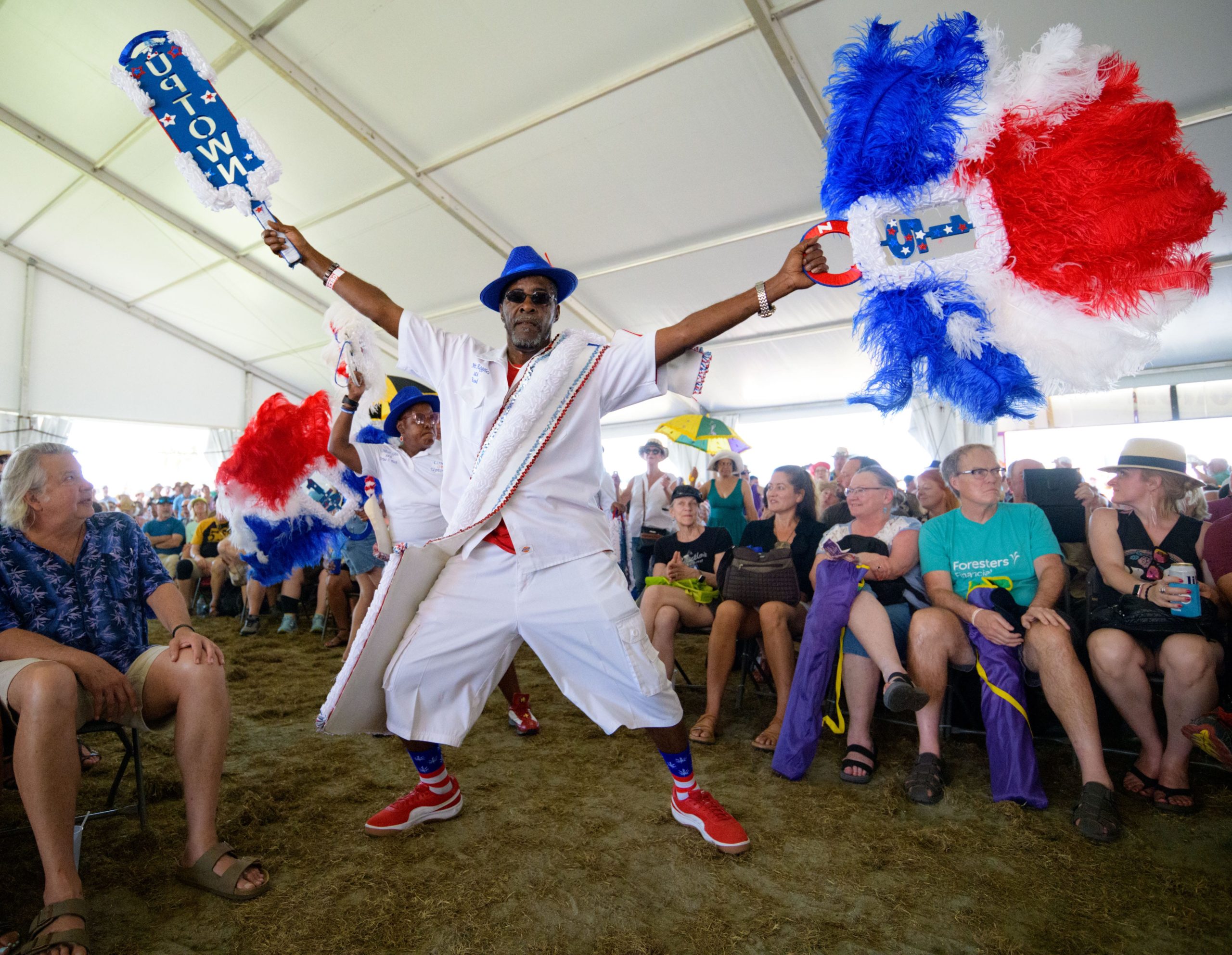 The Uptown Swingers dance to the music of the Treme Brass Band in the Economy Hall Tent during the 50th New Orleans Jazz and Heritage Festival at the Fair Grounds in New Orleans, La. Sunday, April 28, 2019. Photo by Matthew Hinton