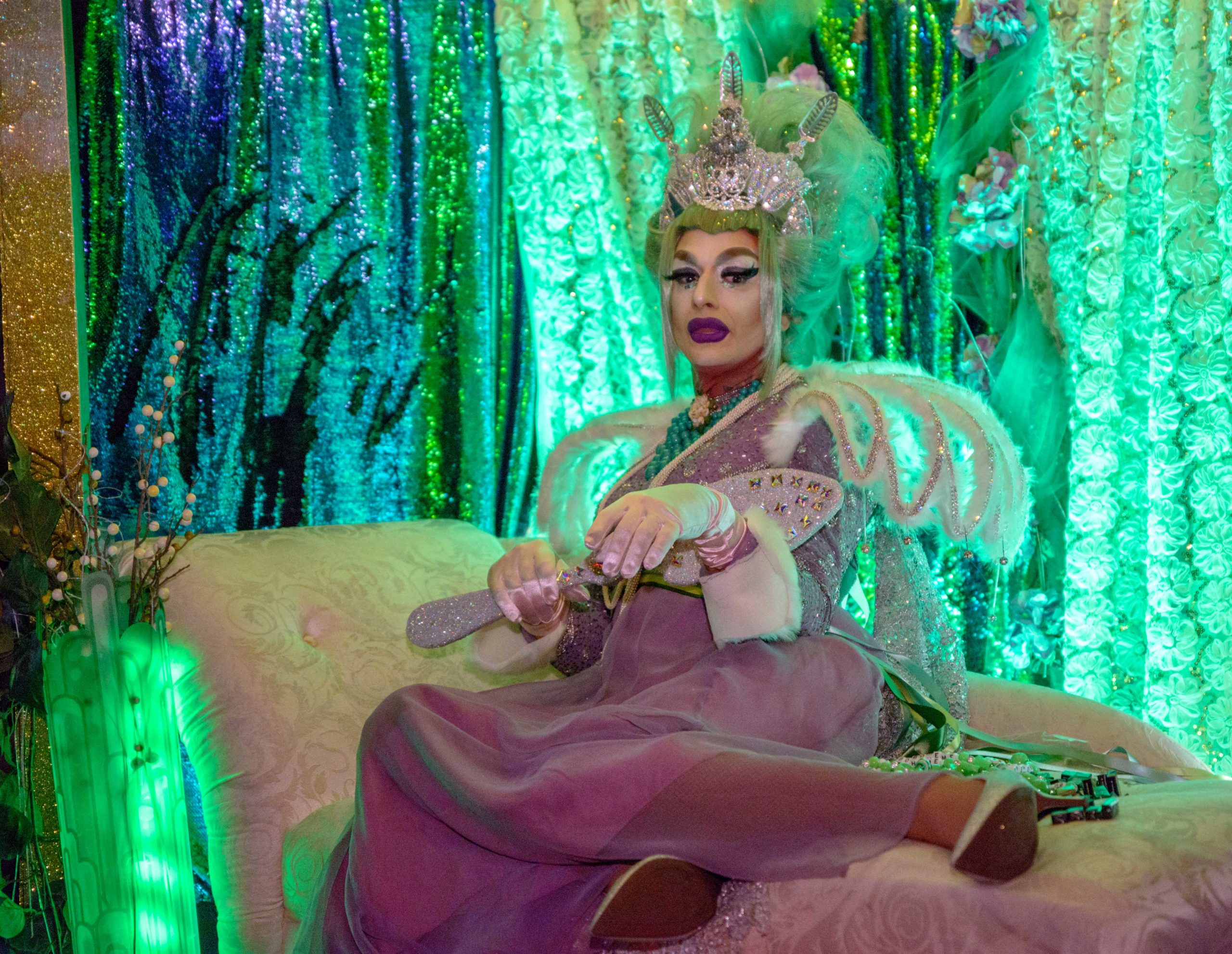 The first Krewe Bohème parades through the Marigny and continued through the French Quarter in New Orleans, La. Friday, Feb. 15, 2019. The procession is led by a symbol of the bohemian spirit, a green absinthe fairy seen here, followed by several inner krewe marching clubs including: the Krewe of Goddesses, the Merry Antoinettes, Krewe of R.U.M. (Really Unsophisticated Men), Krewe of King James: The Super Bad Sex Machine, Krewe of Hellarious Wingnuts, Krewe of S.L.U.T.S. (Sexy Ladies Up to Something), Krewe What Thou Wilt, Les ReBelles, Flora &amp; Fauna, Skinz N Bonez, Dystopian Paradise, The Bayou Babes, Krewe D'Ensite, Krewe of Full Bush, Krewe de la Renaissance, Interrobang Parading Krewe, and Menage-a-Trike. Photo by Matthew Hinton