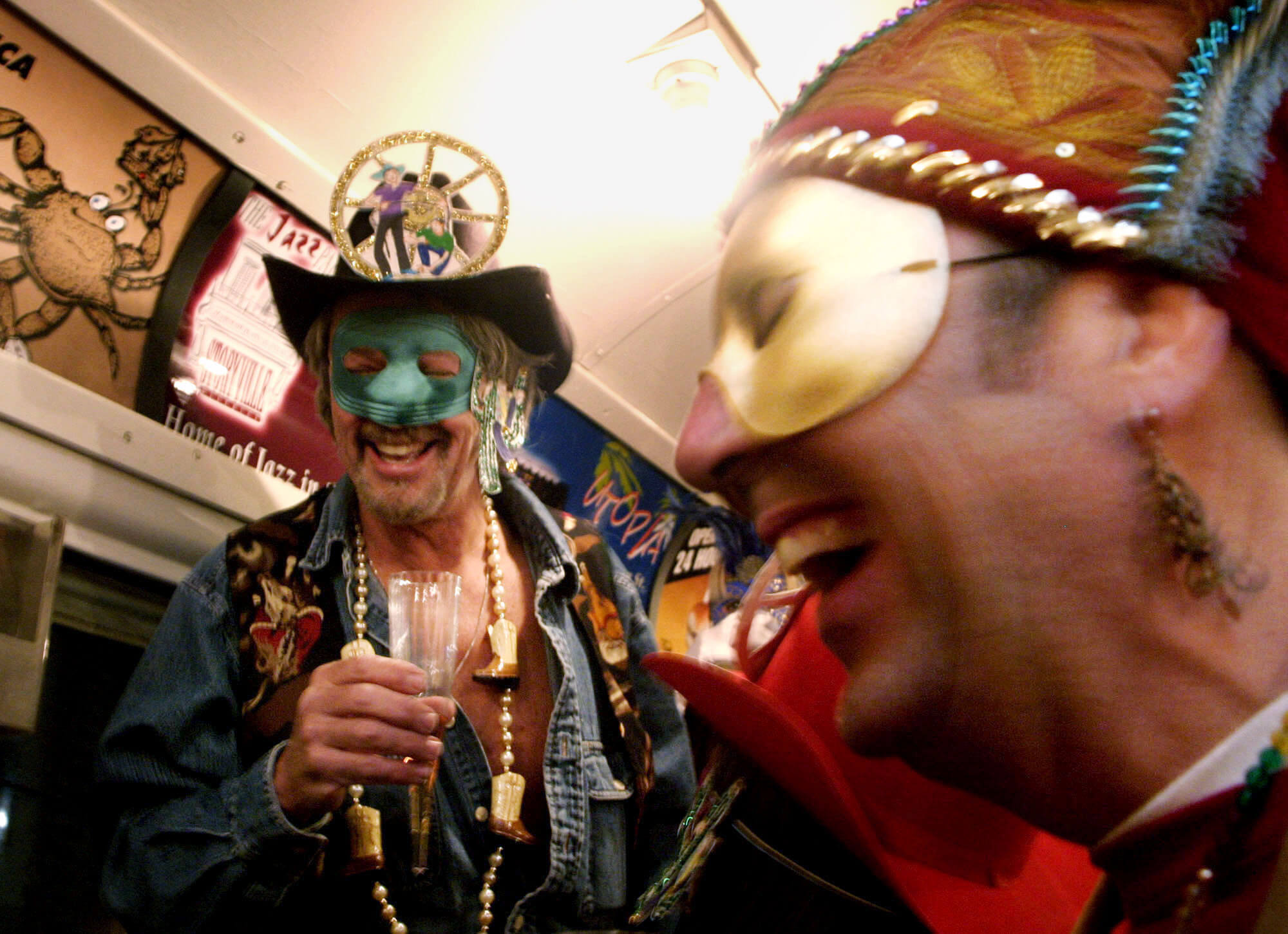 UNITED STATES - JANUARY 06:  Members of the Phunny Phorty Phellows celebrate on street car along Canal Street on "Twelth Night" heralding the arrival of Madi Gras season in New Olreans, Louisiana, on Friday, December 6, 2006.  (Photo by Mario Villafuerte/Bloomberg via Getty Images)