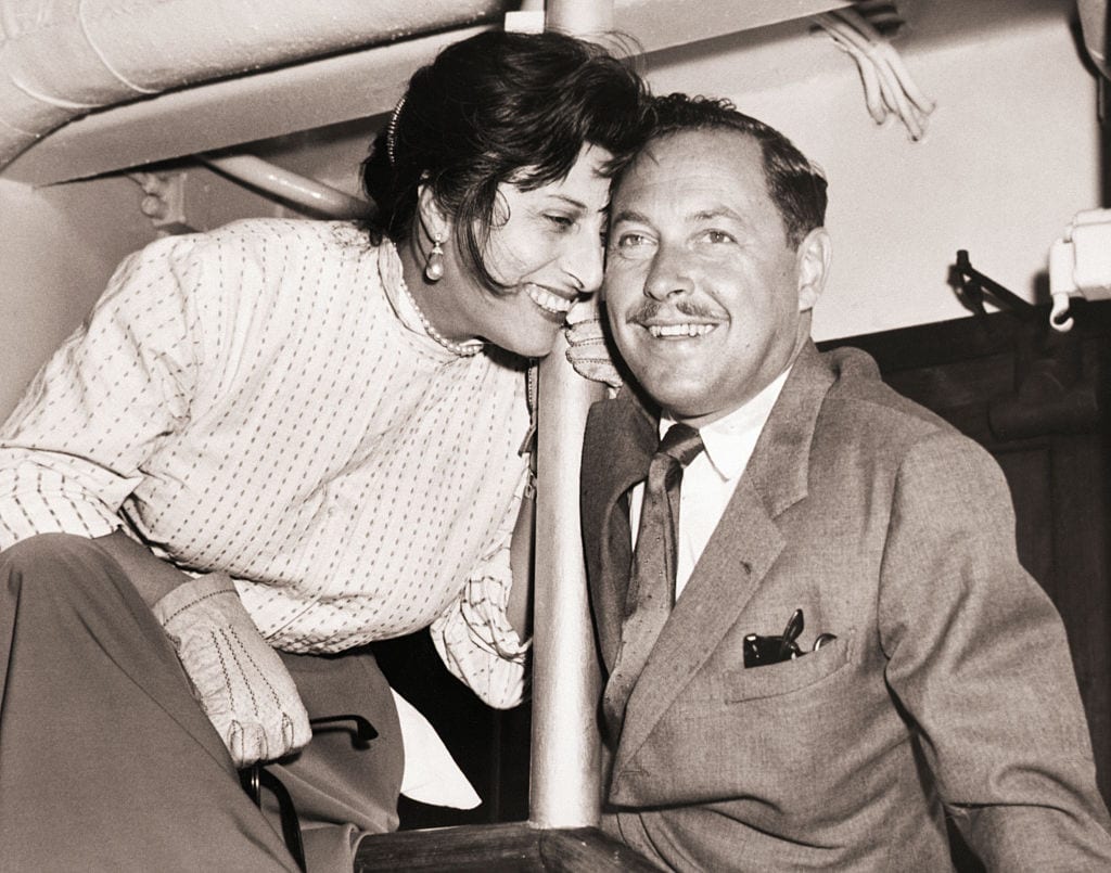 (Original Caption) 9/30/1954-New York, NY- Italian actress Anna Magnani and playwright Tennessee Williams arrive on the liner Andrea Doria, enroute to Key West, Florida, for the filming of "The Rose Tattoo." Miss Magnani will star in the movie version of the Williams play. Williams will detour to New Orleans for a conference with James Elliott on the latter's production of "Lord Byron's Love Letter," Williams' first opera.