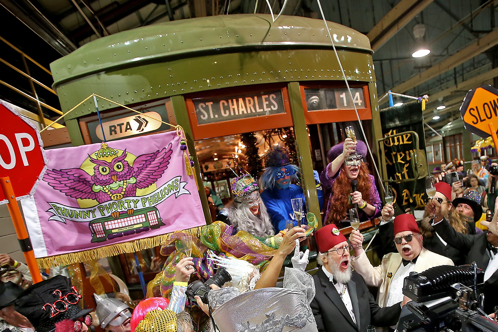 The men and women of the Phunny Phorty Phellows embark on their traditional Twelfth Night streetcar ride, leaving from the Willow Street car barn and riding the tracks through New Orleans to herald the start of Carnival season on Monday, January 6, 2020.