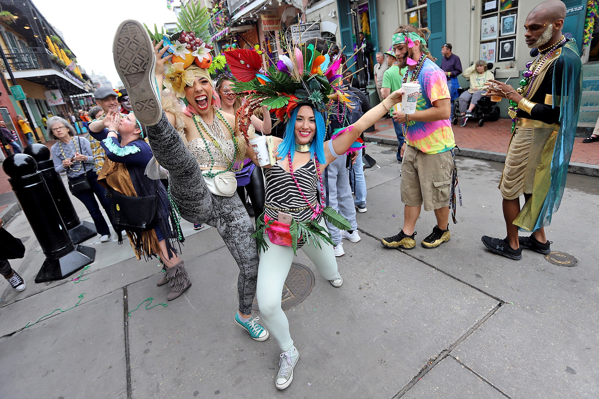 Revelers dress up and join the mayhem in the French Quarter on Mardi Gras Day, 2020. (Photo by Michael DeMocker)