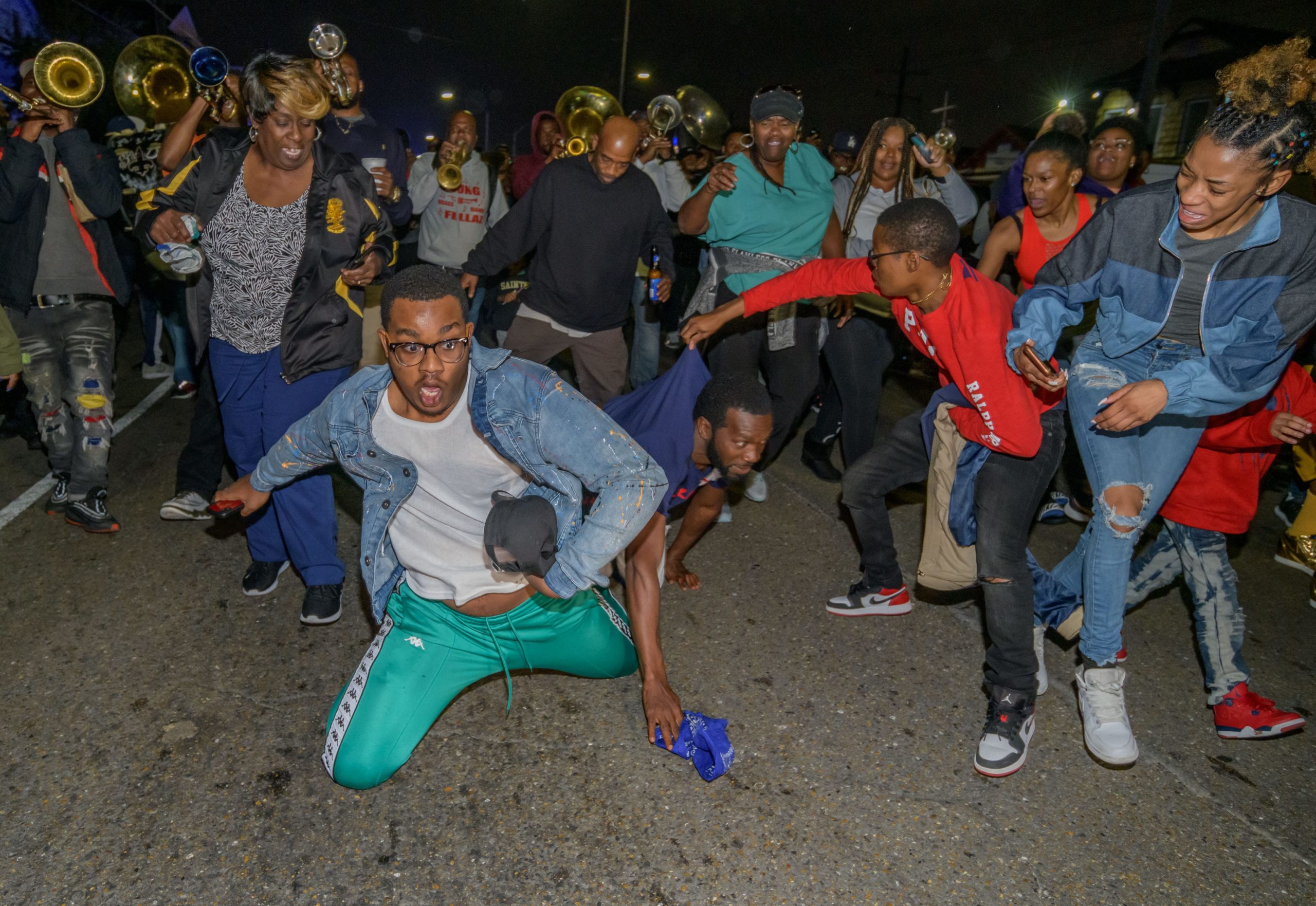 New Orleanians dance in a second line memorial parade for 5th Ward Weebie, Jerome Cosey, a bounce music pioneer and rapper know for the song Let Me Find Out and Get Out the Way Thursday, January 9, 2020. The paraded started from the Zulu Social Aid and Pleasure Club at Broad Street and Orleans Ave. Cosey was 42 years old and died from complications from a heart attack. He made music with Master P, and Mystikal, appeared in a video with Drake and was also known for the song F Katrina released in 2006 after Hurricane Katrina. Photo by Matthew Hinton