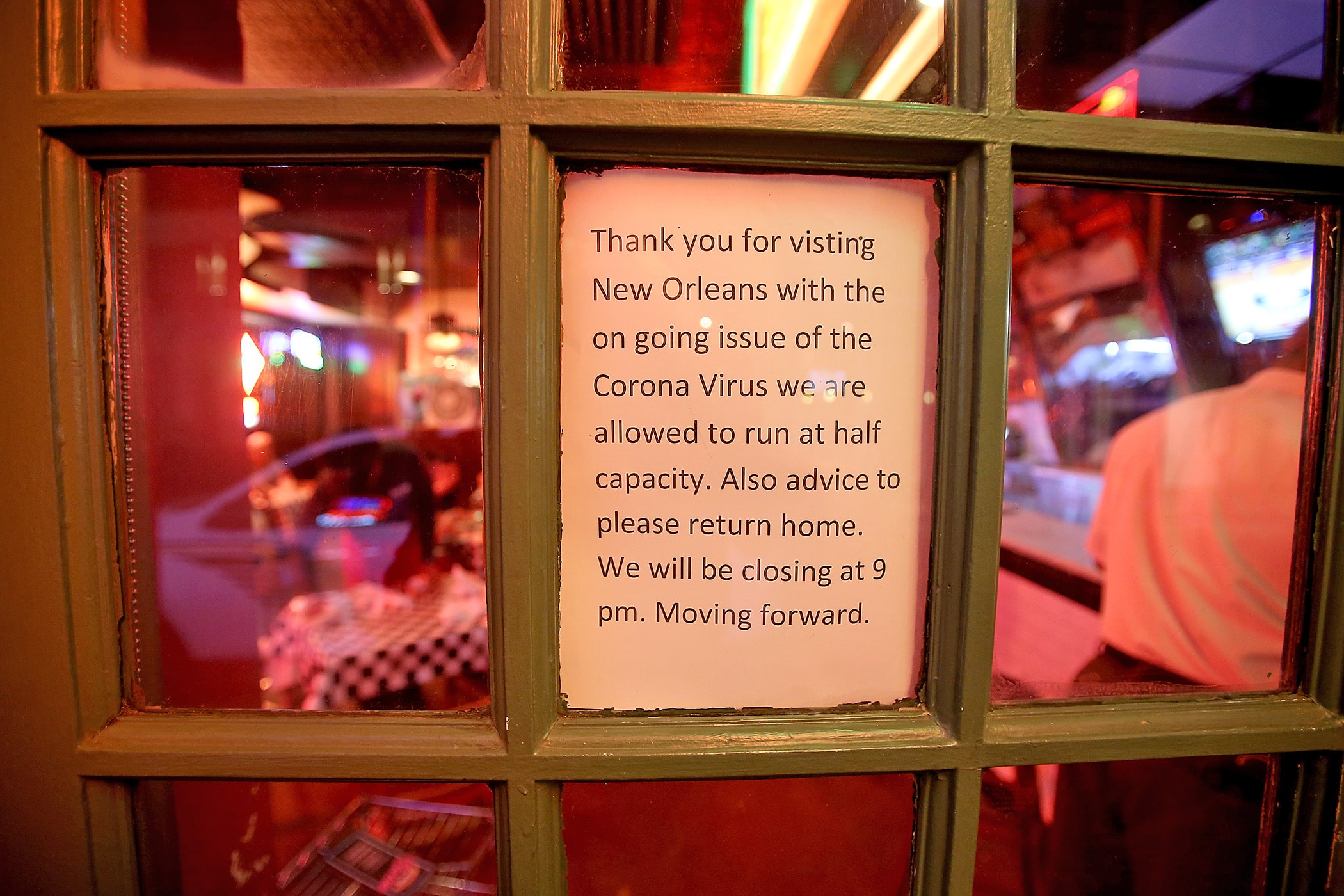 Just after 9 p.m., a restaurant in the French Quarter shuts its doors to comply with the city’s order on Sunday evening, March 15, 2020.