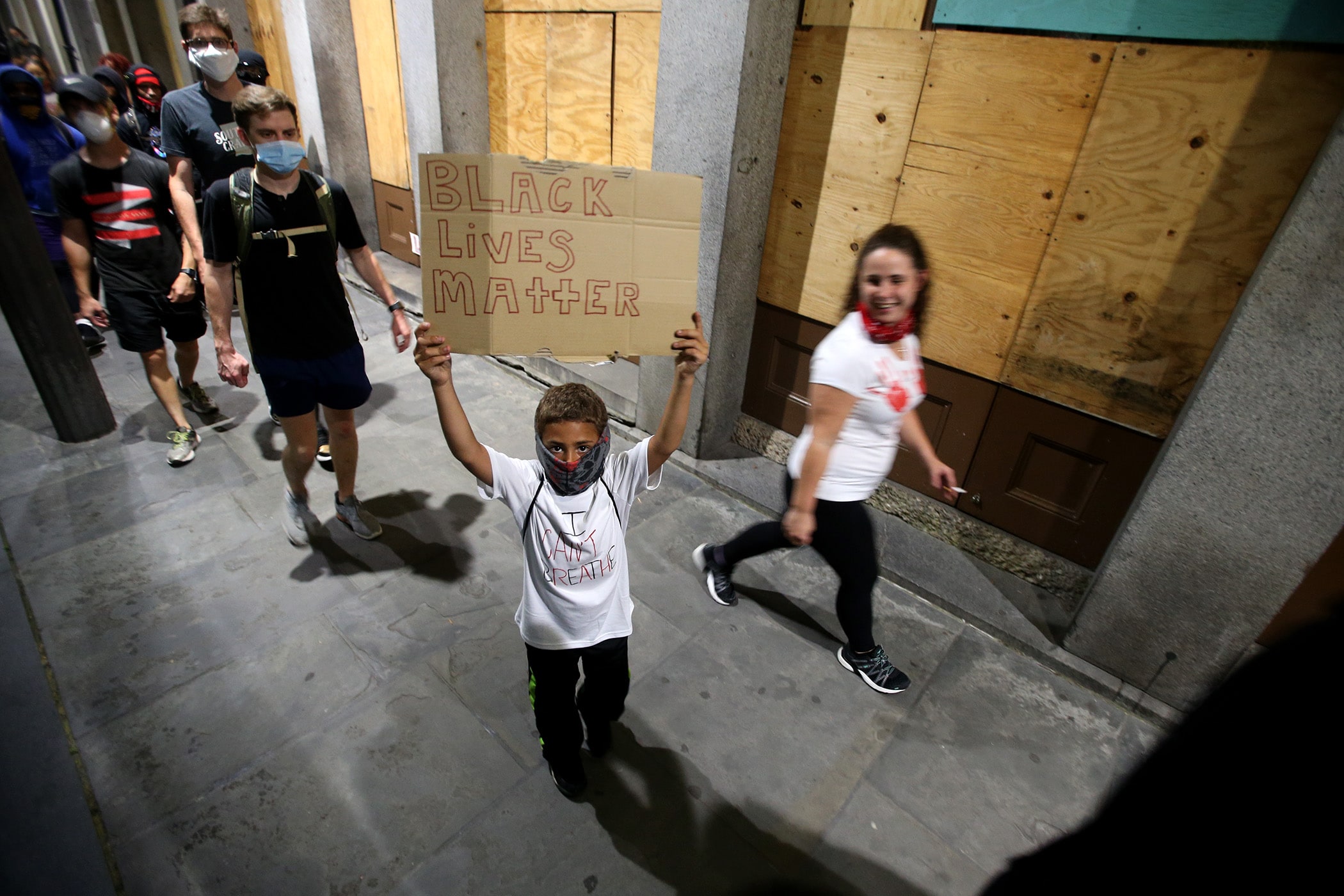 Protestors march past St. Louis Cathedral after a rally outside Jackson Square to protest the killing by police of George Floyd and others. Photographed on Friday, June 5, 2020. (Photo by Michael DeMocker)
