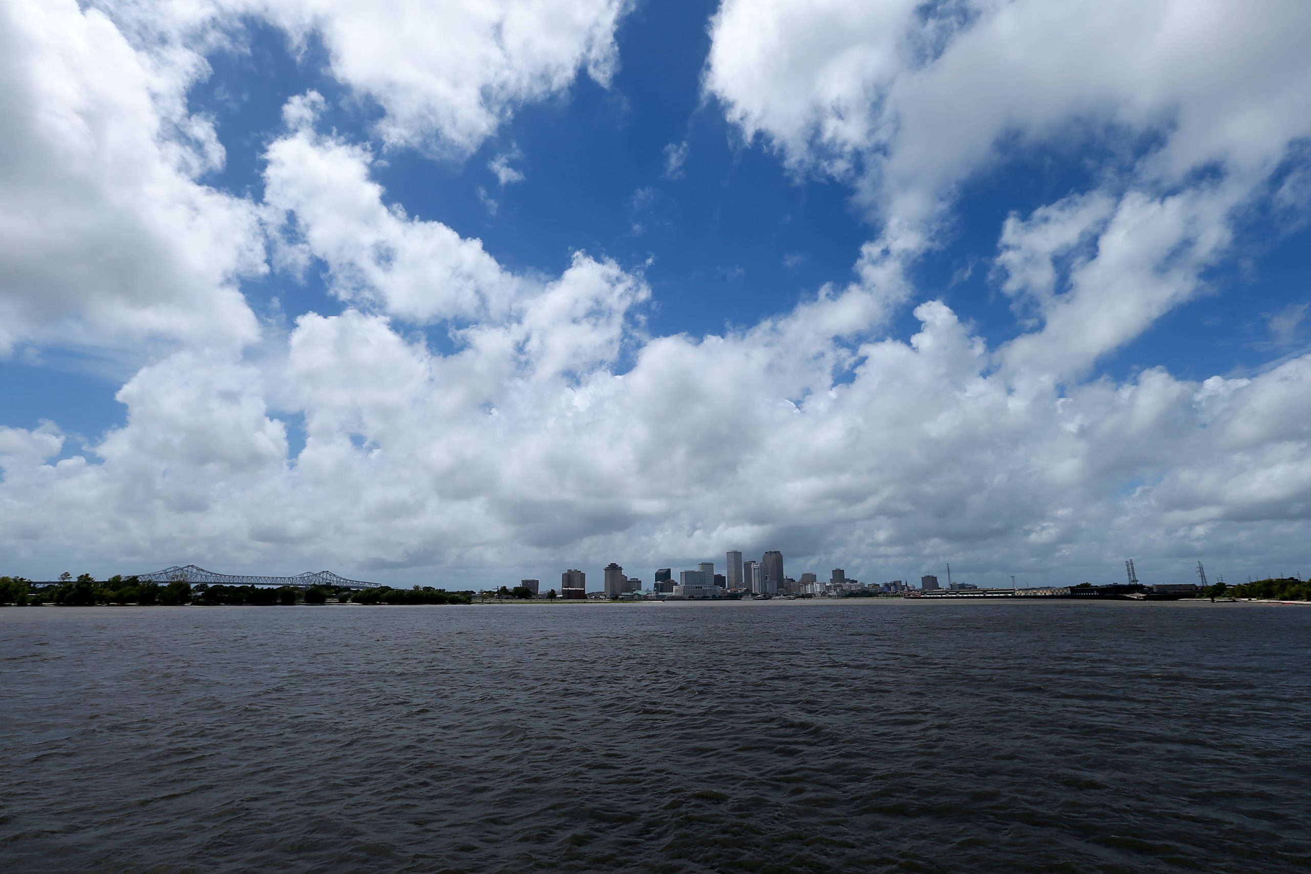 NEW ORLEANS, LOUISIANA  - AUGUST 25:   Storm clouds are seen over the Mississippi River and downtown New Orleans as Hurricane Laura churns in the Gulf of Mexico on August 25, 2020 in New Orleans, Louisiana. Hurricane Laura is expected to hit somewhere along the Gulf Coast late Wednesday and early Thursday. (Photo by Sean Gardner/Getty Images)