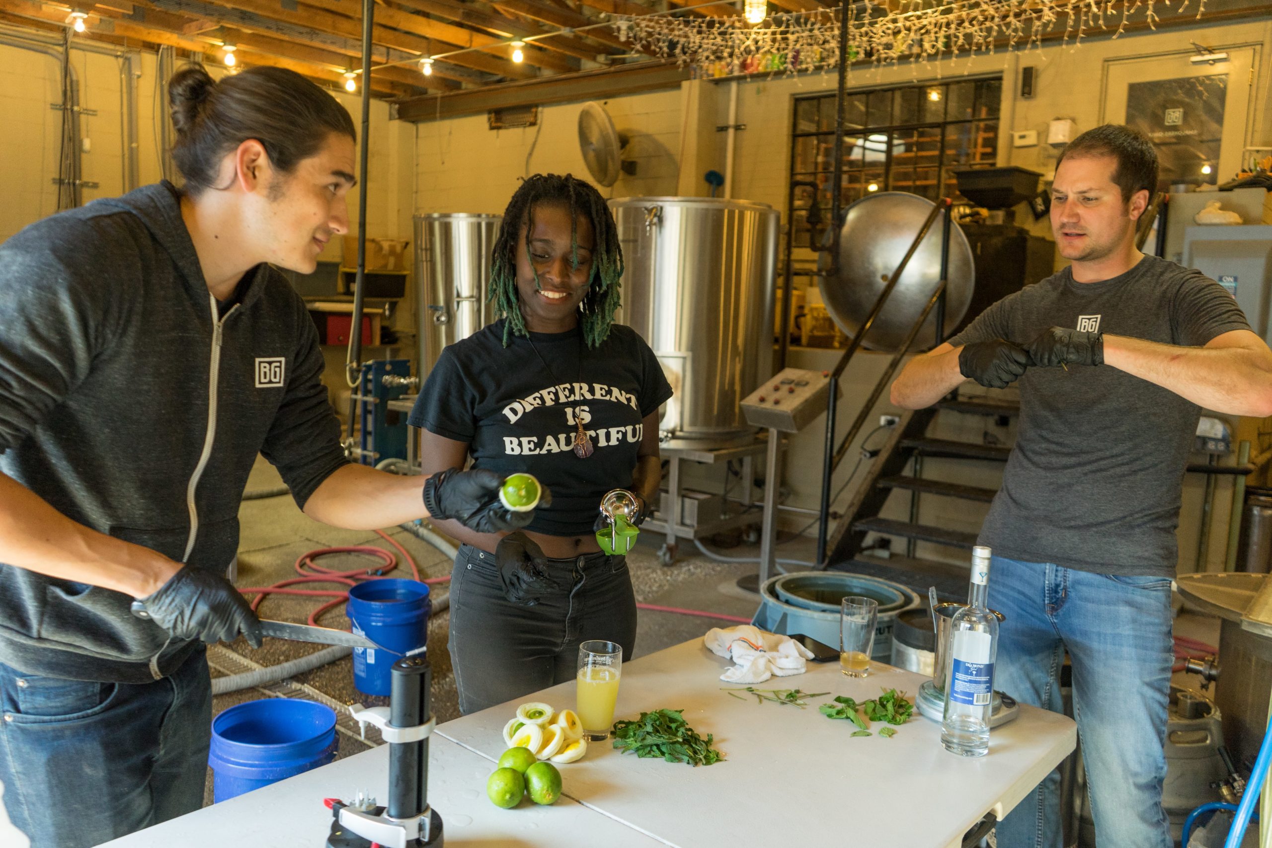 Chardae Jones, interim mayor of Braddock (center) working alongside the Brew Gentlemen team on their collaboration beer that will debut at Fresh Fest on Aug. 10. Photo: Brian Conway