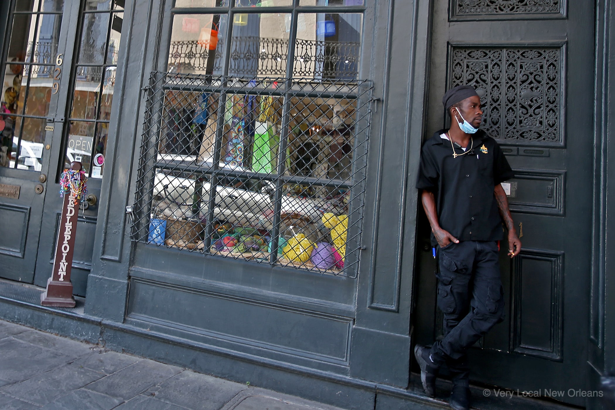 A restaurant worker takes a break on Chartres Street on Saturday, September 5, 2020. (Photo by Michael DeMocker)
