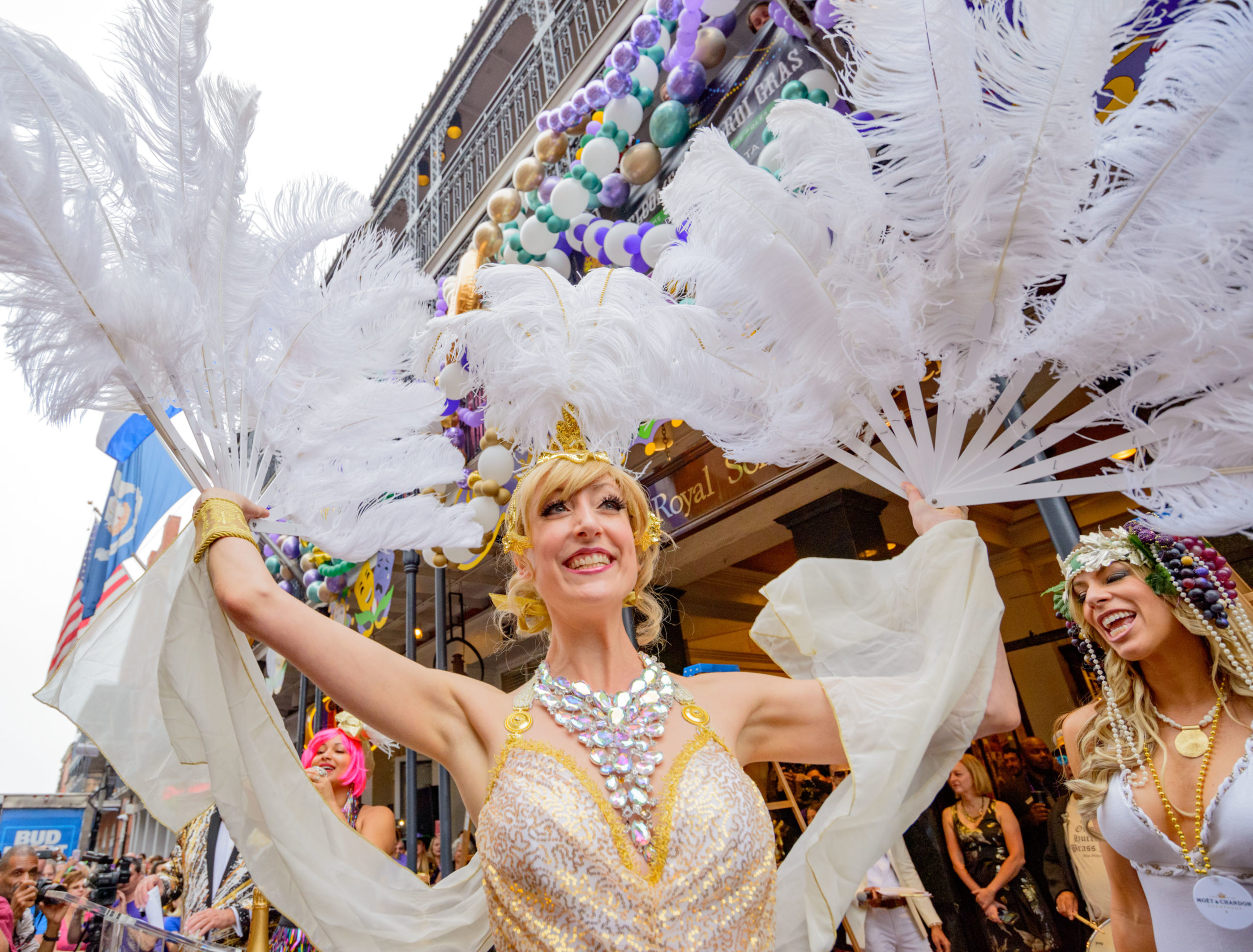 Burlesque dancer Trixie Minx walks on stage as local celebrity contestants take part in the 50th annual Greasing of the Poles at the Royal Sonesta Hotel on Bourbon Street to kick off Mardi Gras festivities in the French Quarter in New Orleans, La. Friday, March 1, 2019. Trixie Minx Productions hosts a weekly burlesque show on Fridays at the hotel called Burlesque Ballroom. The poles are traditionally greased to prevent people from climbing them during the week leading up to Mardi Gras. Photo by Matthew Hinton