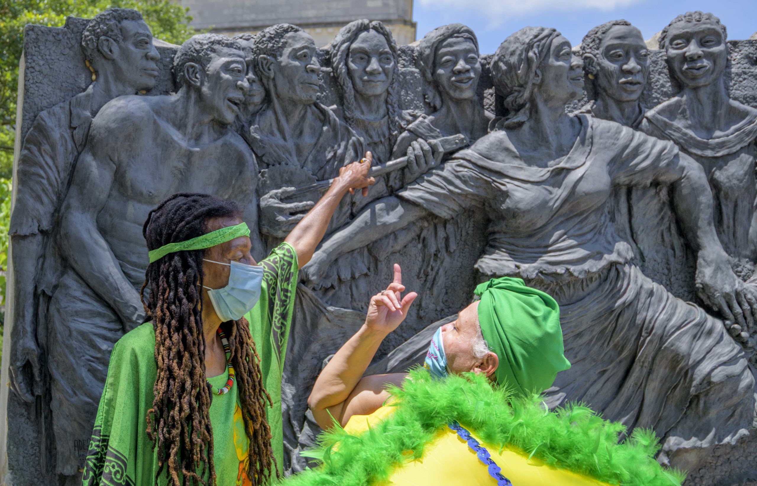 The Baby Dolls formed a prayer circle underneath the Ancestor Tree in Congo Square at Louis Armstrong Park to observe Juneteenth on Saturday June 20, 2020 in the Treme neighborhood of New Orleans. Photo by Matthew Hinton