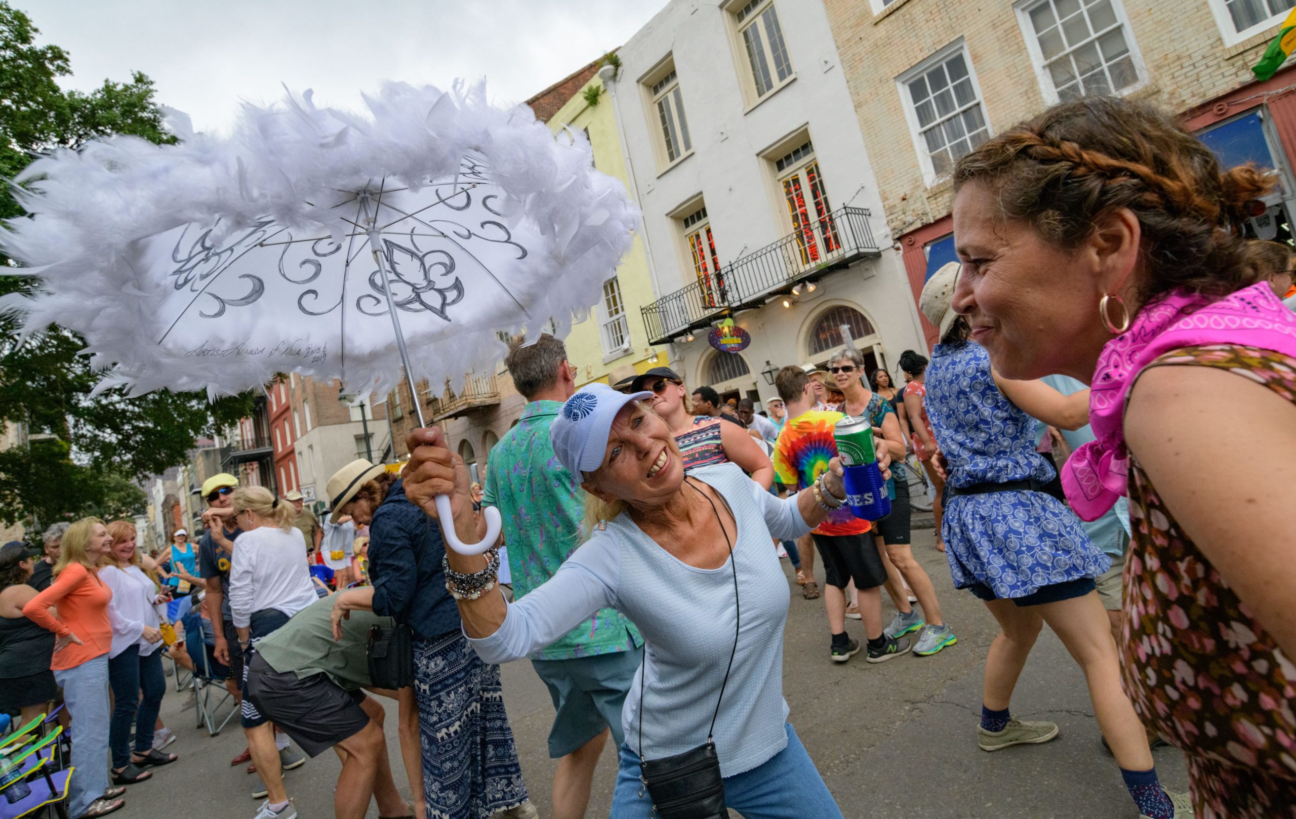 Fans enjoy the performance of Dwayne Dopsie and the Zydeco Hellraisers at the Chevron Stage in the Bienville Triangle during the 36th annual French Quarter Festival in New Orleans, La. Saturday, April 13, 2019. The festival states 'more than 20 stages throughout the French Quarter celebrate local music and represent every genre from traditional and contemporary jazz to R&amp;B, New Orleans funk, brass bands, folk, gospel, Latin, Zydeco, classical, cabaret, and international.' Photo by Matthew Hinton