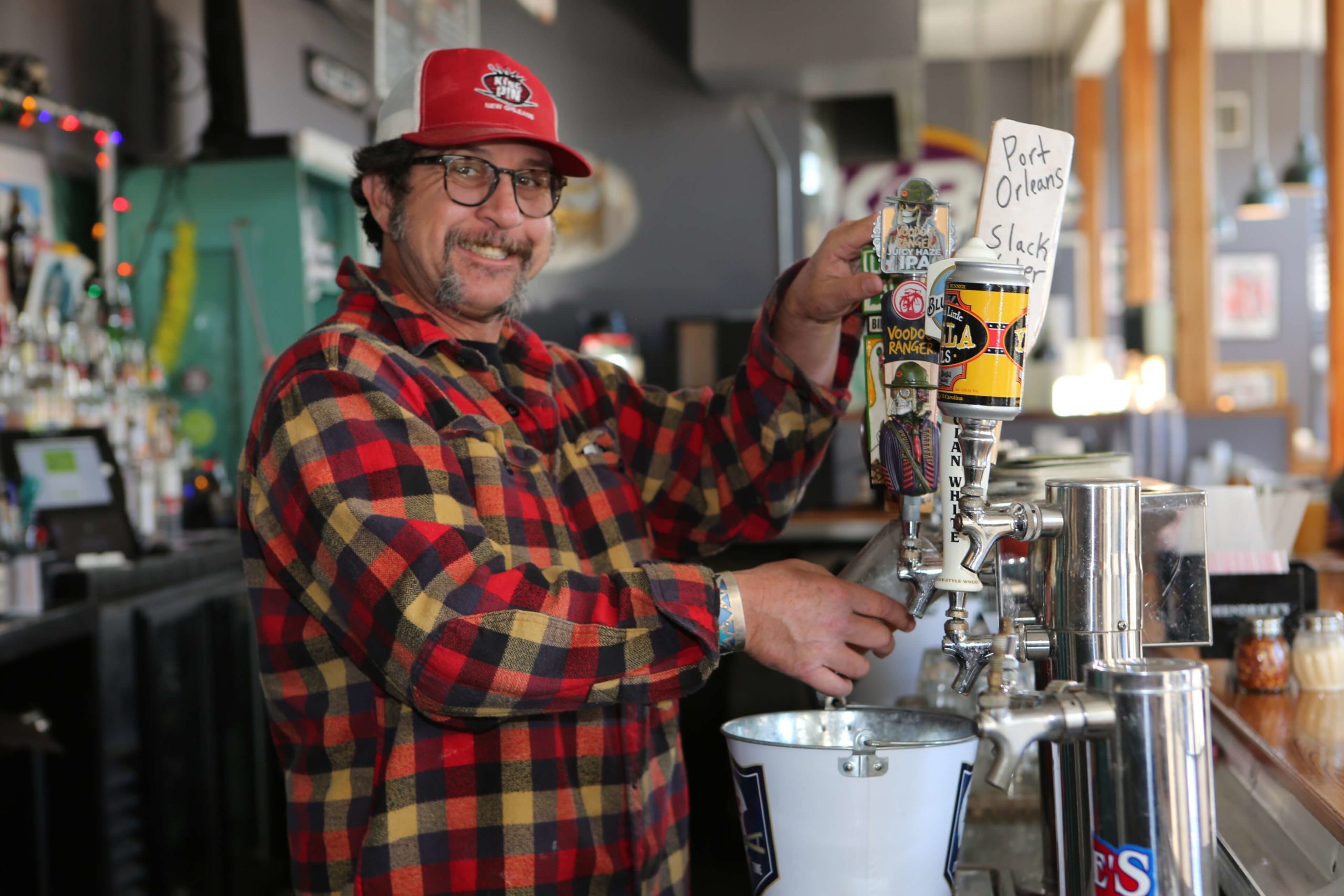 The Midway on Freret Street owner, Steve Watson pours a beer as a part of the People of Freret project in New Orleans on Tuesday, December 4, 2018.  (Photo by Peter G. Forest)